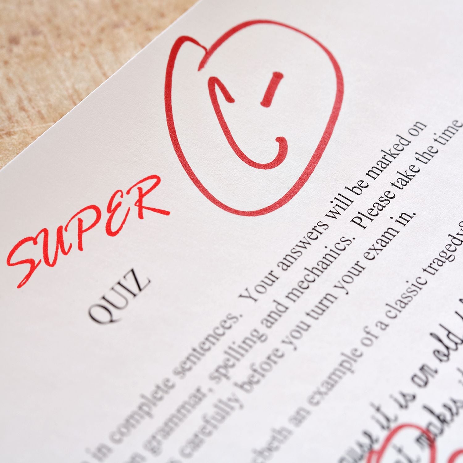 A paper marked with a red C and the word SUPER using the Large Pre-Inked Super Stamp, indicating a graded quiz.