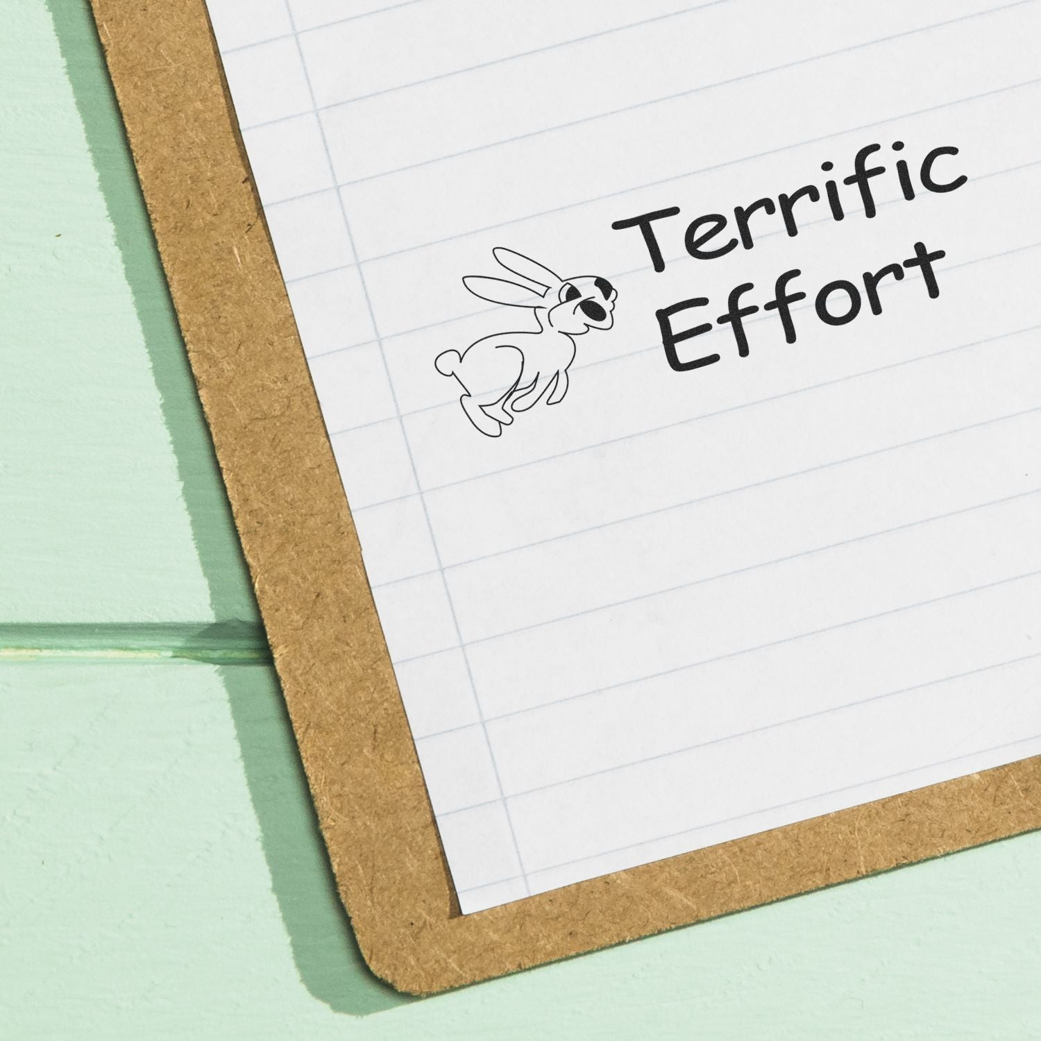 Slim Pre-Inked Terrific Effort Stamp on lined paper with a rabbit wearing sunglasses and the text Terrific Effort.