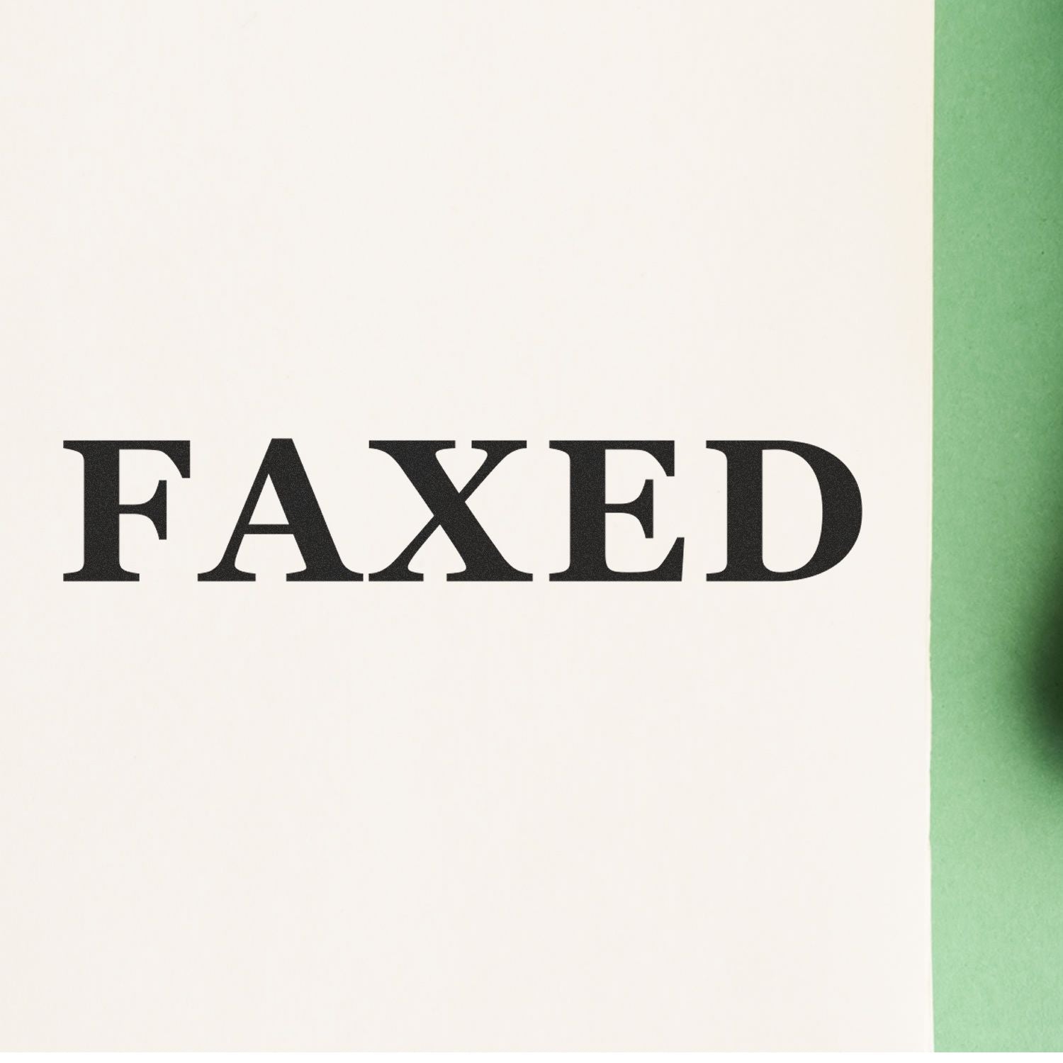 Large Pre-Inked Times Faxed Stamp imprinting the word 'FAXED' in bold black letters on a white paper with a green background.