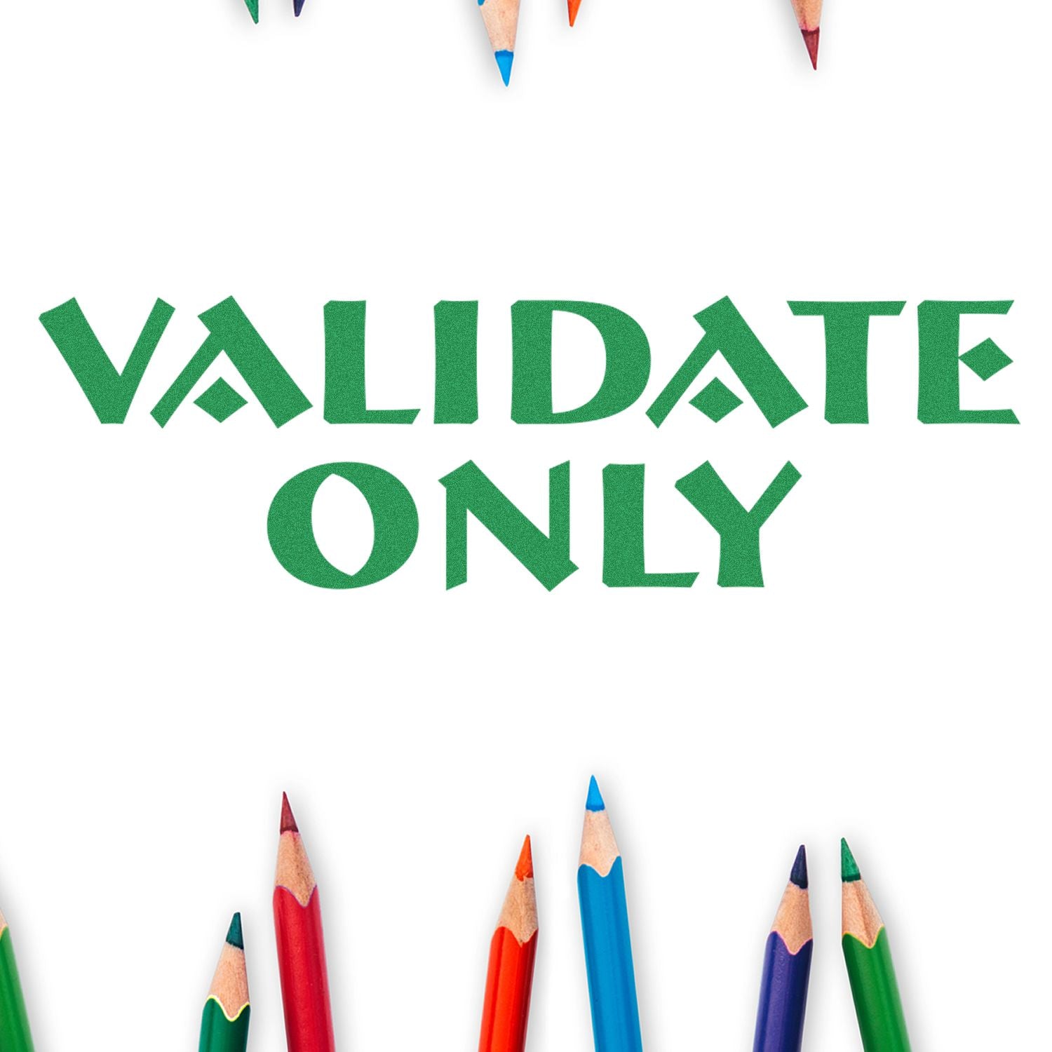 Validate Only rubber stamp impression in green ink surrounded by colorful pencils on a white background.