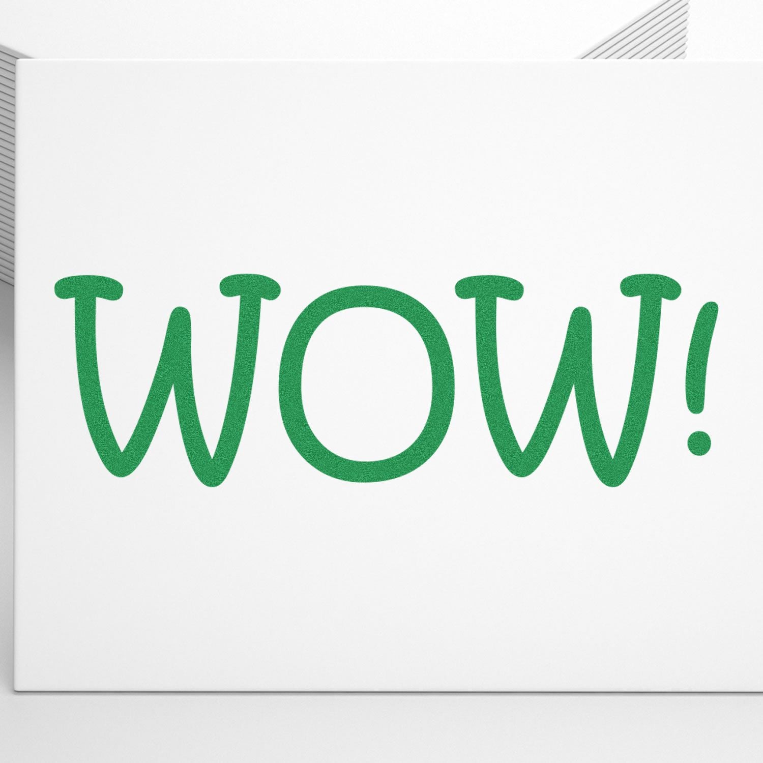 Teacher WOW Rubber Stamp in green ink on white paper, displaying the word 'WOW!' in large, bold letters.