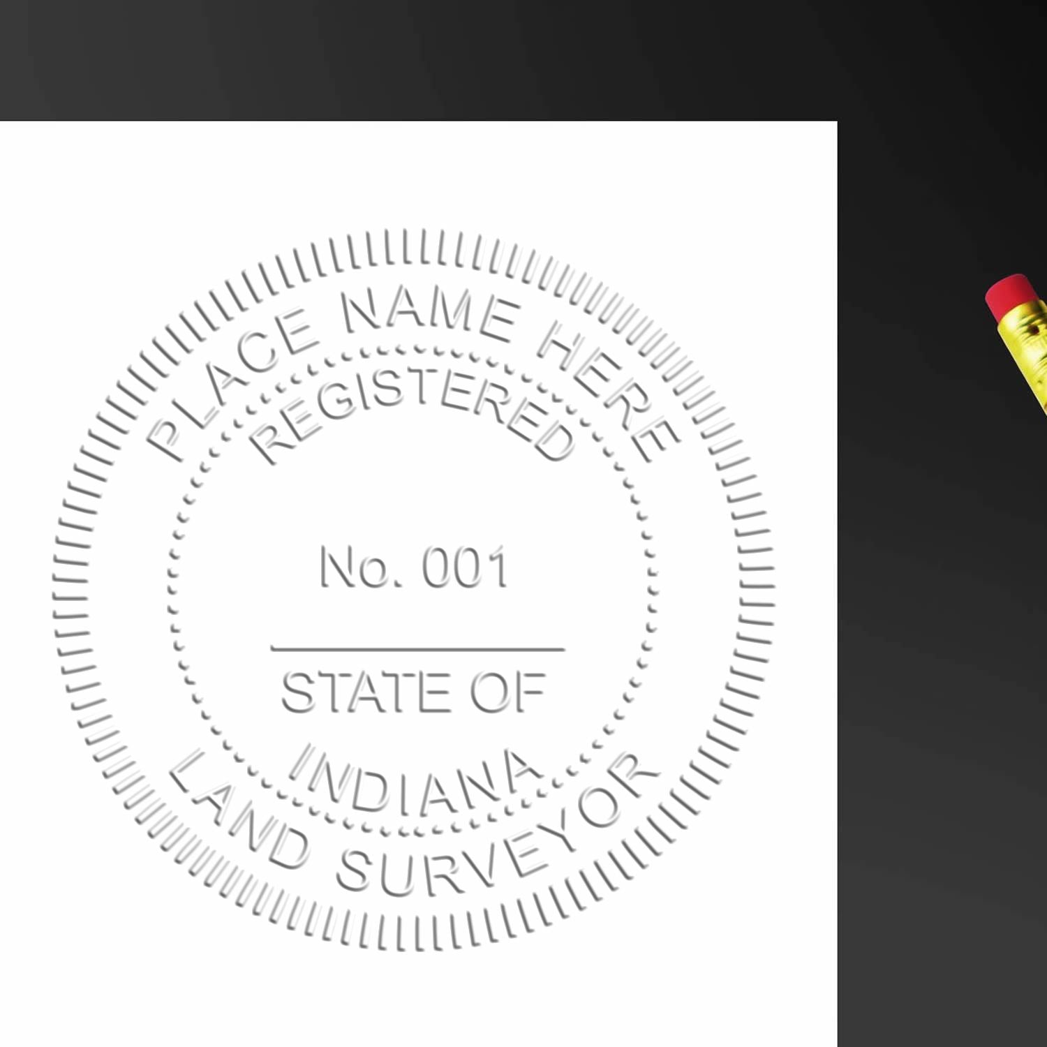 An in use photo of the Hybrid Indiana Land Surveyor Seal showing a sample imprint on a cardstock