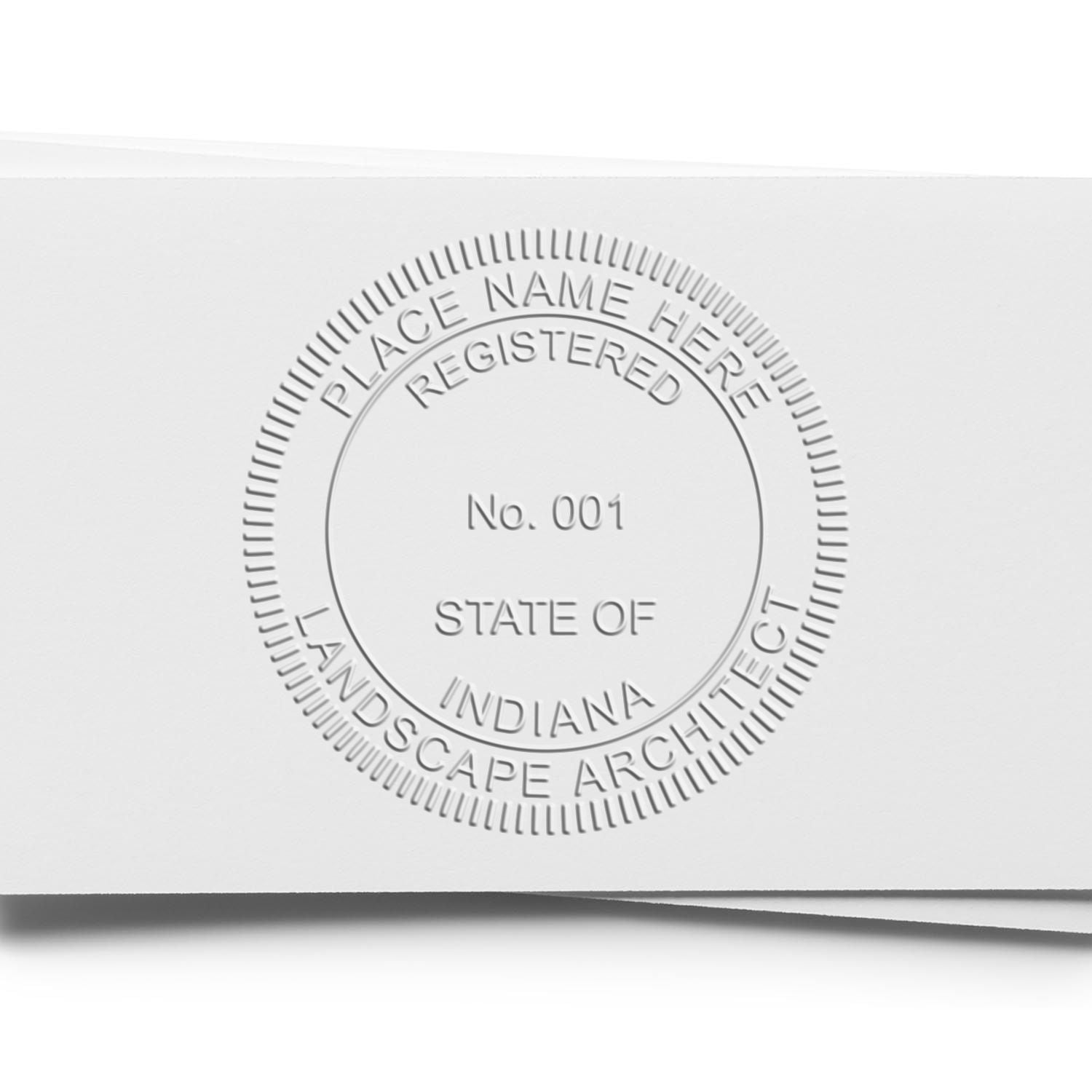 A stamped impression of the State of Indiana Handheld Landscape Architect Seal in this stylish lifestyle photo, setting the tone for a unique and personalized product.