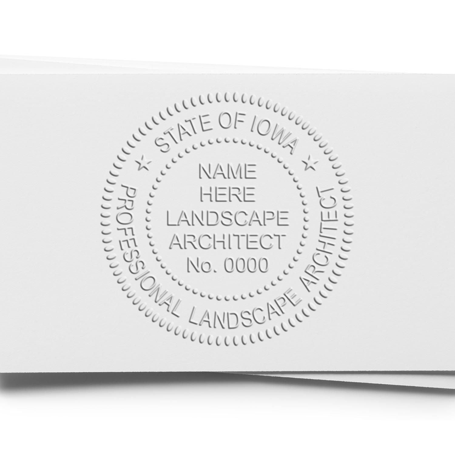 An alternative view of the Iowa Long Reach Landscape Architect Embossing Stamp stamped on a sheet of paper showing the image in use