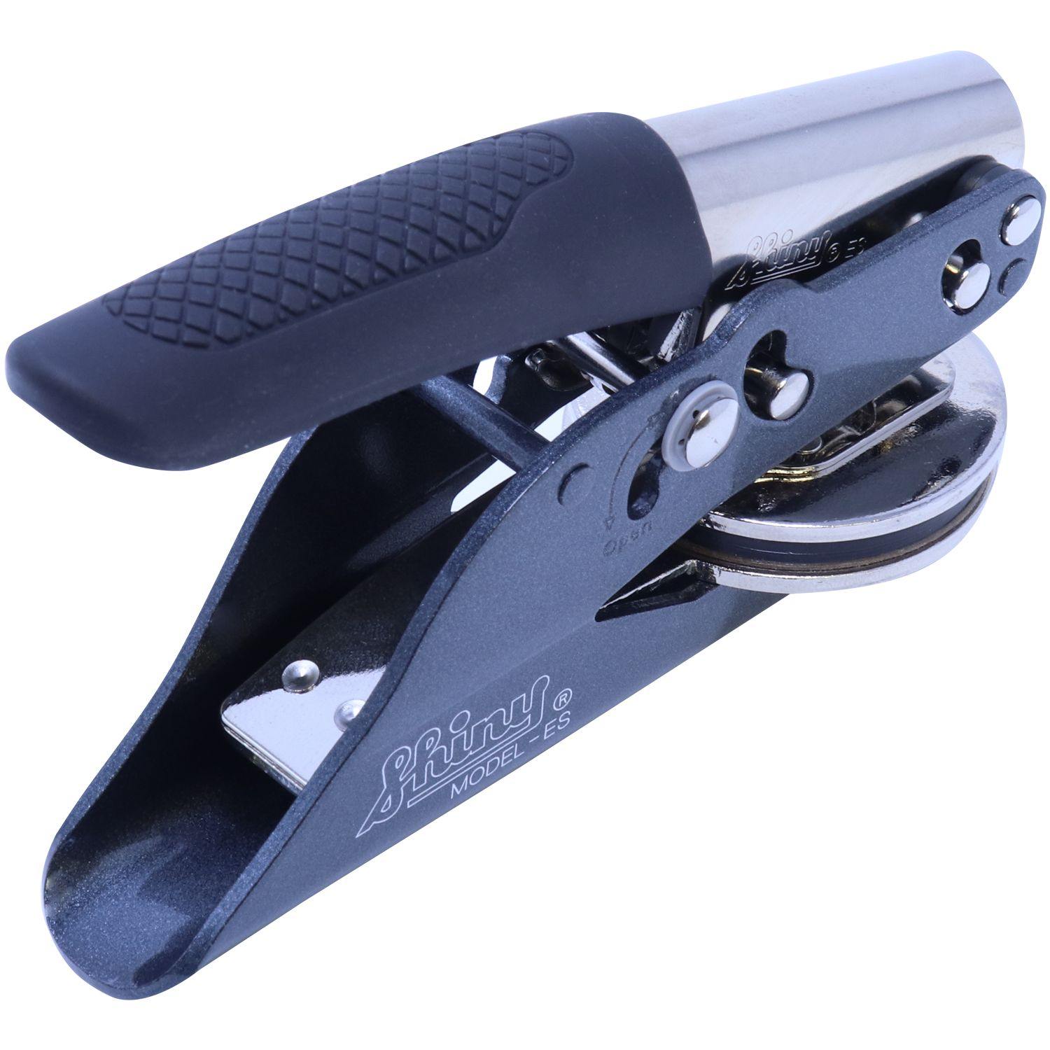 Engineering Geologist Handheld Soft Seal Embosser with a black grip and metallic body, angled side view showing the embossing mechanism.