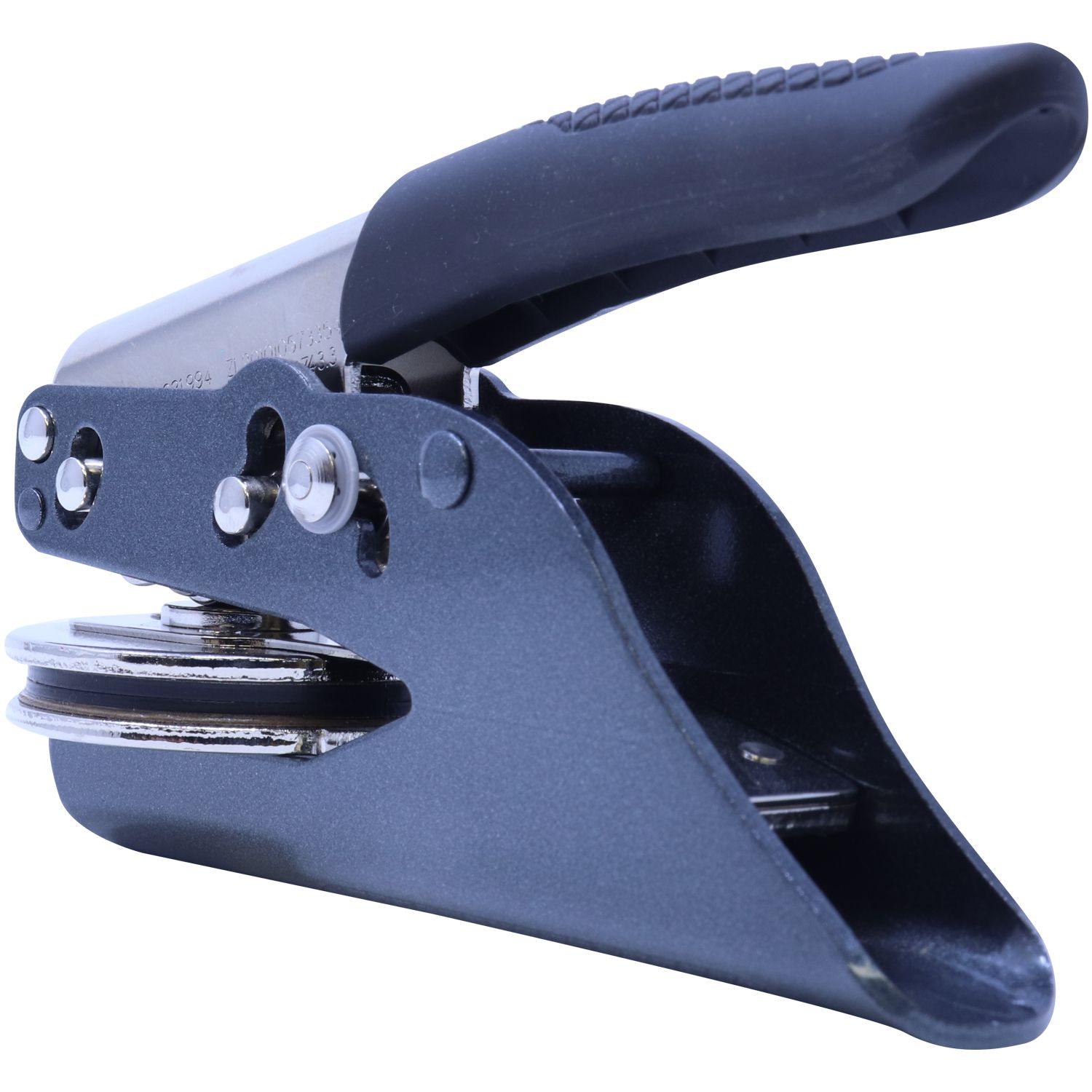 Real Estate Appraiser Soft Seal Embosser with a black ergonomic handle and metal components, shown from a side-angled view.