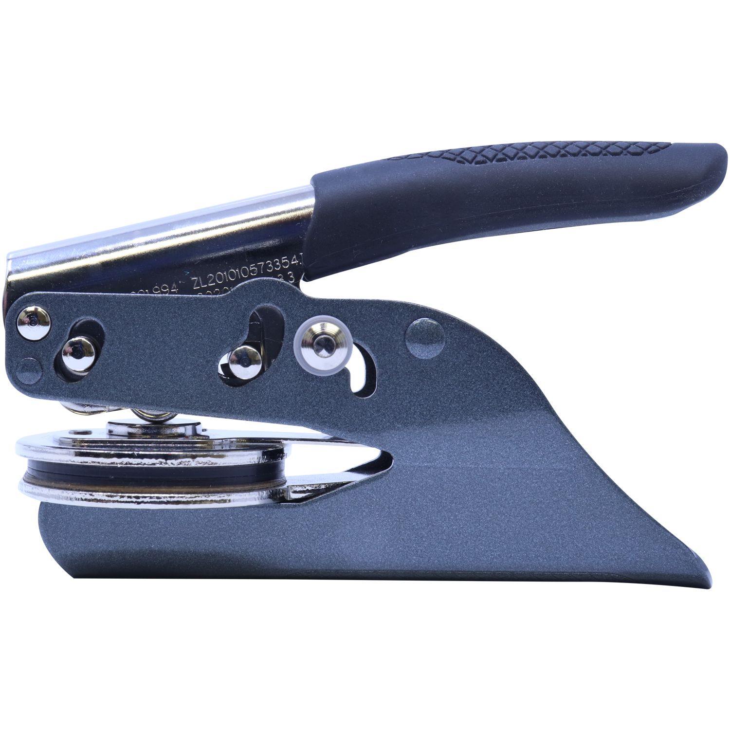 Real Estate Appraiser Soft Seal Embosser with a black handle and metal components, designed for creating embossed imprints on documents.