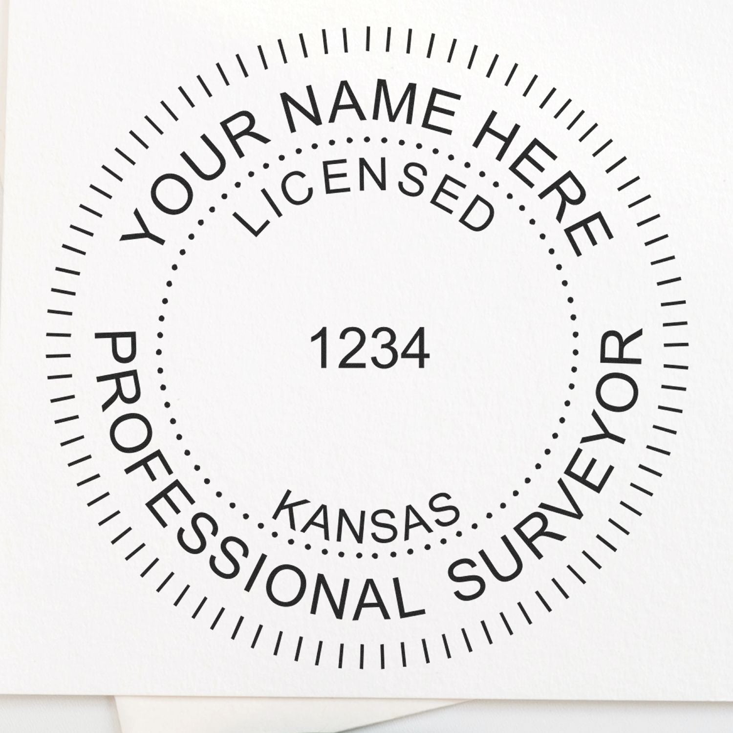 Self Inking Kansas Land Surveyor Stamp with customizable text, displaying YOUR NAME HERE, LICENSED, 1234, KANSAS, and PROFESSIONAL SURVEYOR.