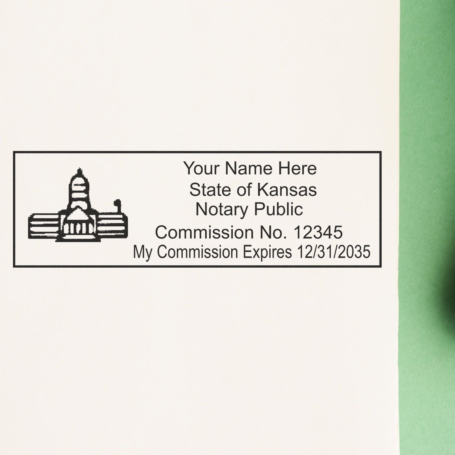 Wood Handle Kansas State Seal Notary Public Stamp imprint on white paper, showing customizable notary details and commission expiration date.