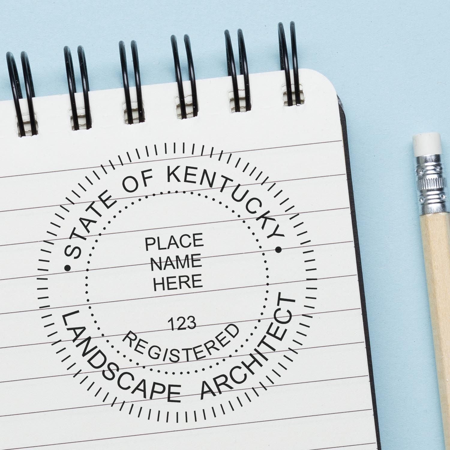 A lifestyle photo showing a stamped image of the Kentucky Landscape Architectural Seal Stamp on a piece of paper