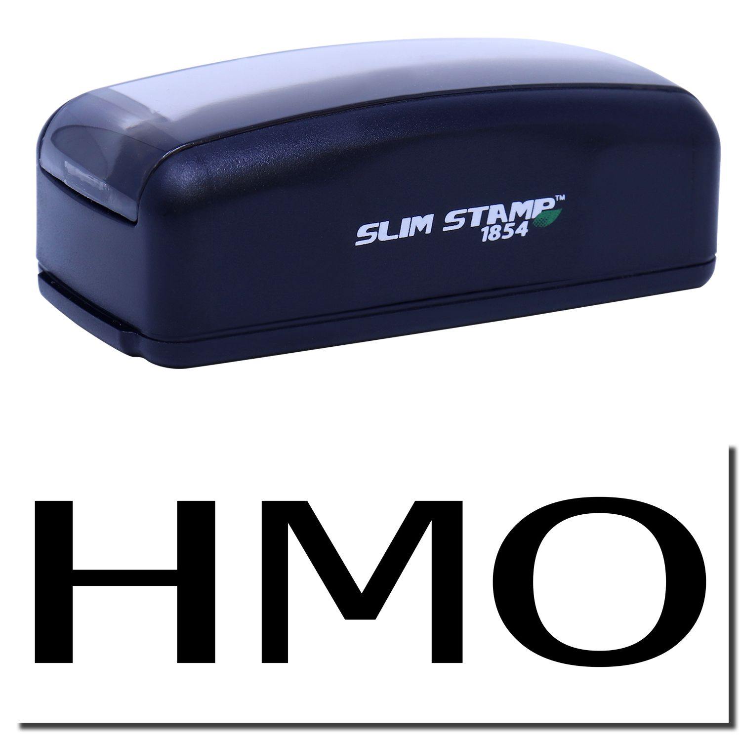 Large Pre-Inked HMO Stamp in black with SLIM STAMP 1854 branding, shown with a clear imprint of HMO in bold black letters.