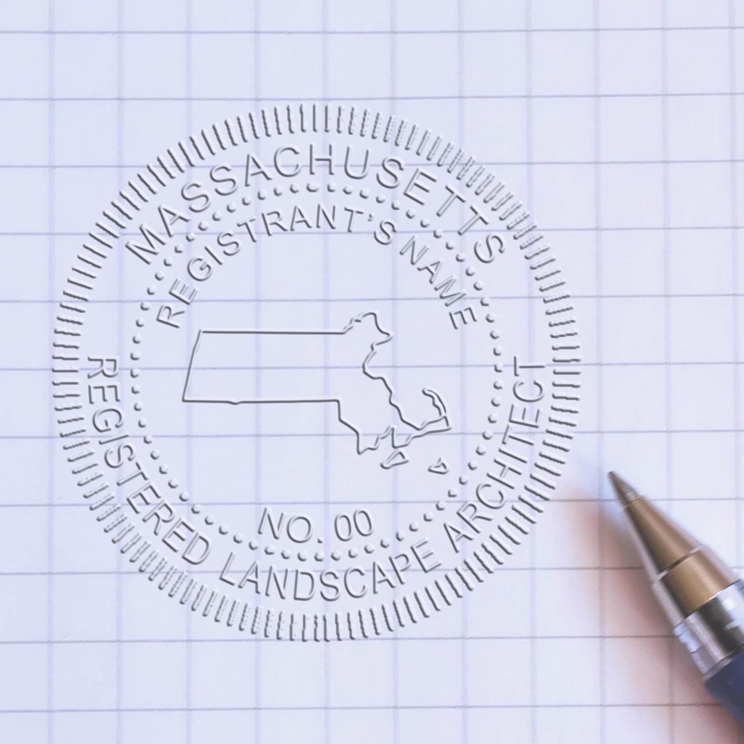 A stamped impression of the State of Massachusetts Handheld Landscape Architect Seal in this stylish lifestyle photo, setting the tone for a unique and personalized product.