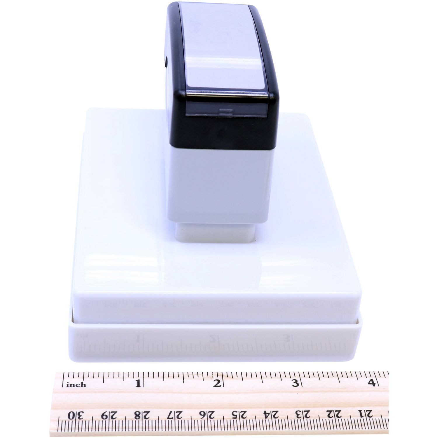 MaxLight XL2-700 Custom Pre-Inked Business Stamp 2-3/4-x 3-3/4 shown next to a ruler for size comparison.