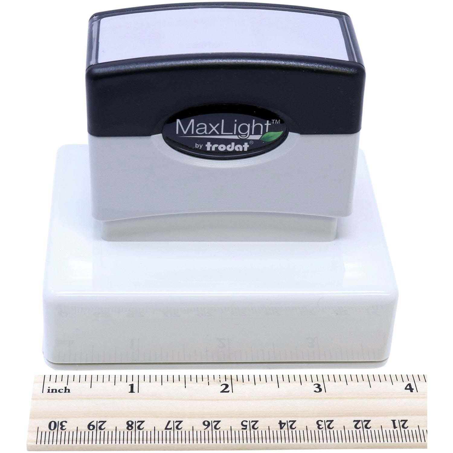 MaxLight XL2-145 Custom Pre-Inked Business Stamp 5/8 x 2-3/8 shown with a ruler for scale, highlighting its compact size and design.