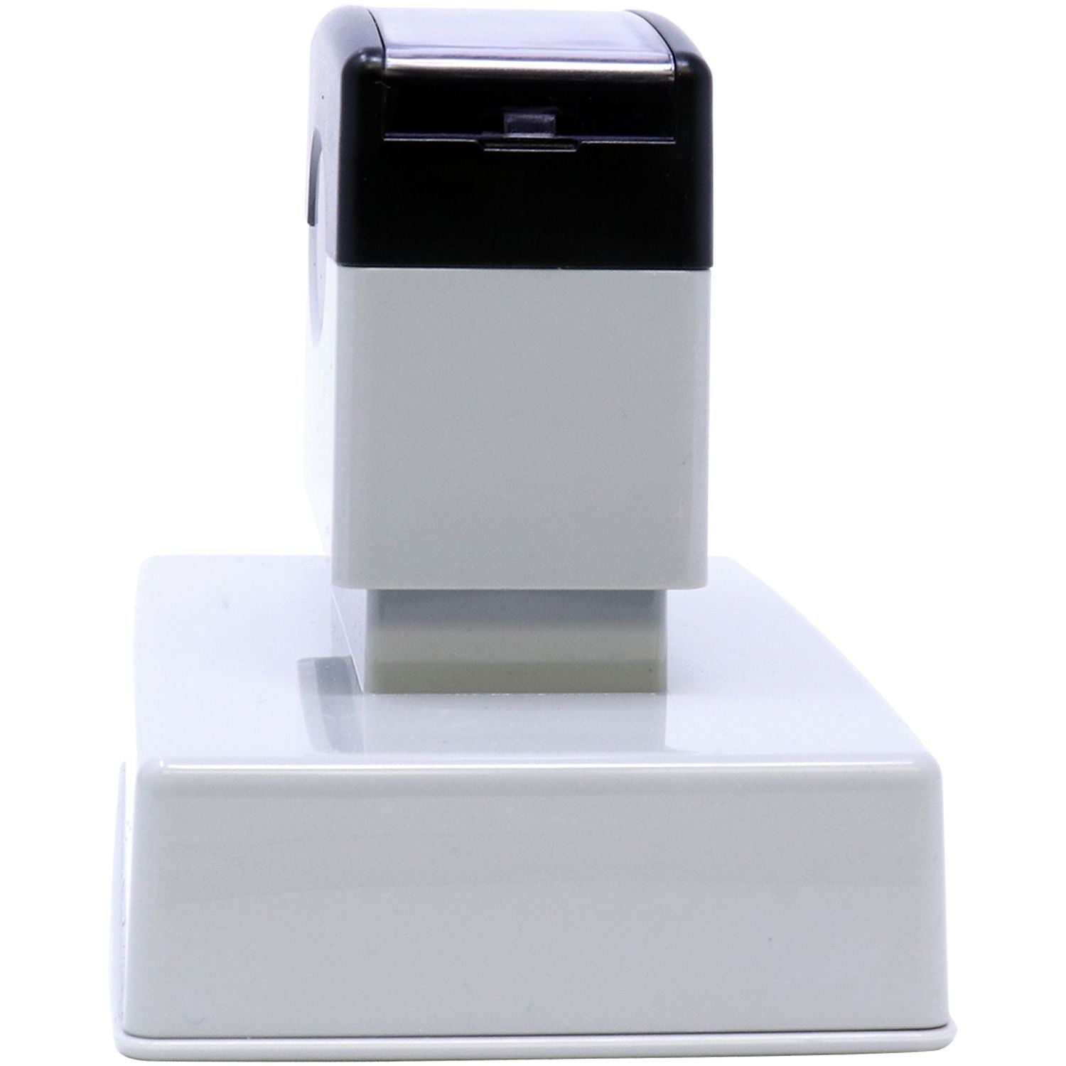 MaxLight XL2-700 Custom Pre-Inked Business Stamp 2-3/4-x 3-3/4, shown from a side angle, featuring a sleek black and white design.