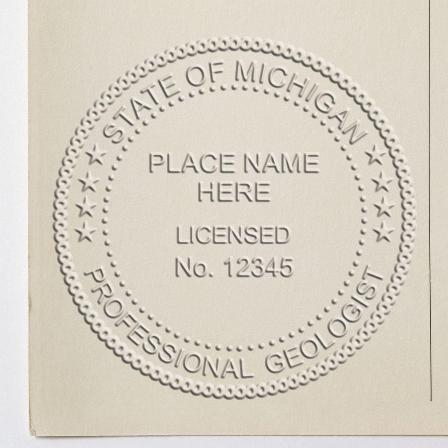 A lifestyle photo showing a stamped image of the Handheld Michigan Professional Geologist Embosser on a piece of paper