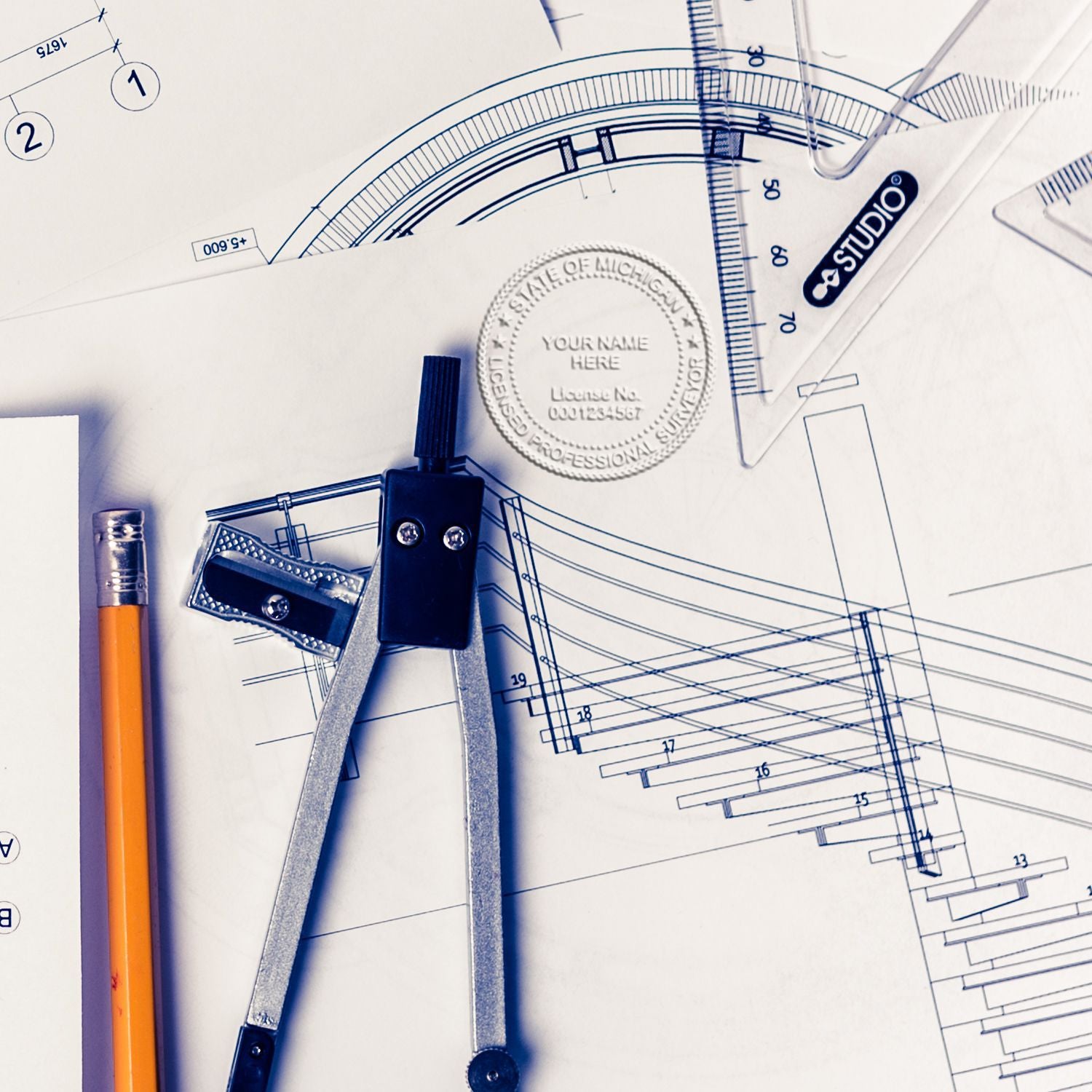 Another Example of a stamped impression of the Handheld Michigan Land Surveyor Seal on a piece of office paper.