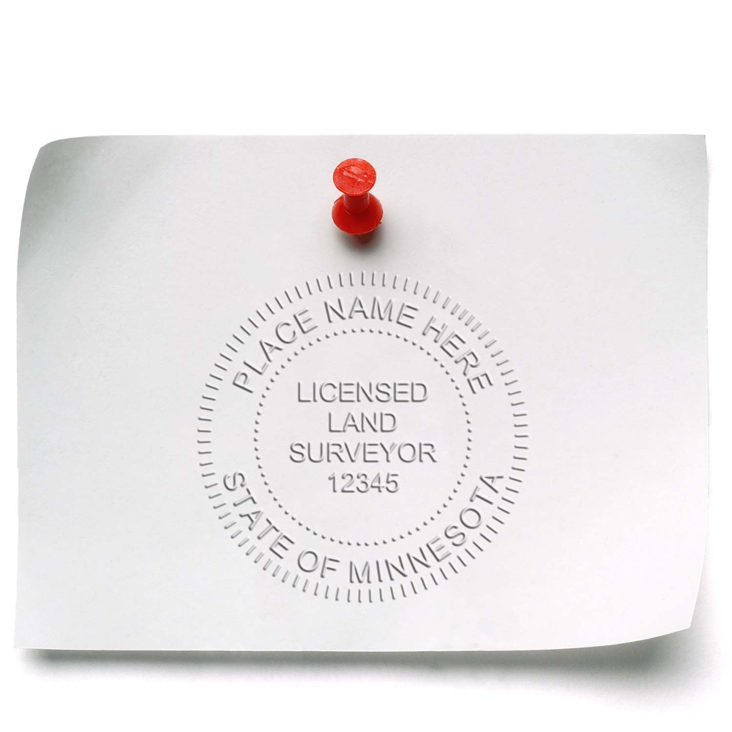 An alternative view of the Hybrid Minnesota Land Surveyor Seal stamped on a sheet of paper showing the image in use