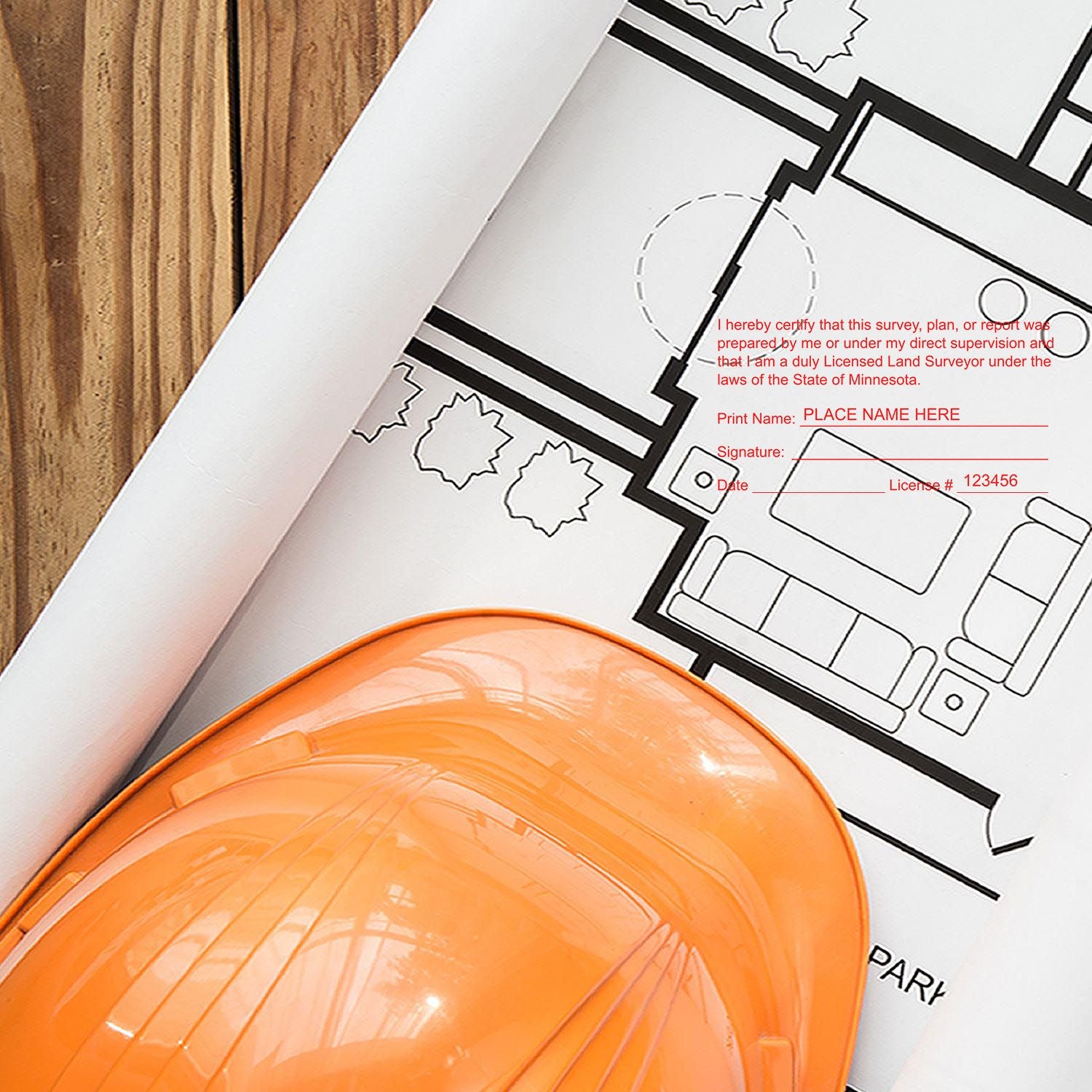 Digital Minnesota Land Surveyor Stamp, Electronic Seal for Minnesota Land Surveyor on a blueprint with an orange hard hat.