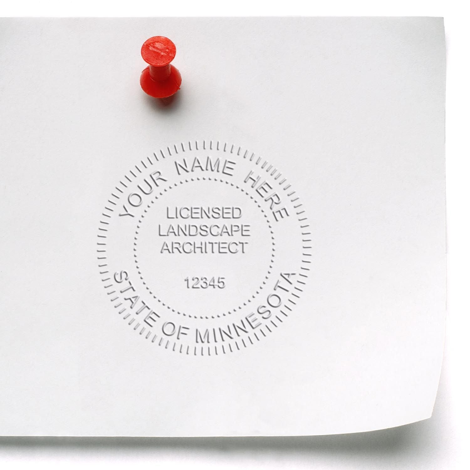 The State of Minnesota Handheld Landscape Architect Seal stamp impression comes to life with a crisp, detailed photo on paper - showcasing true professional quality.