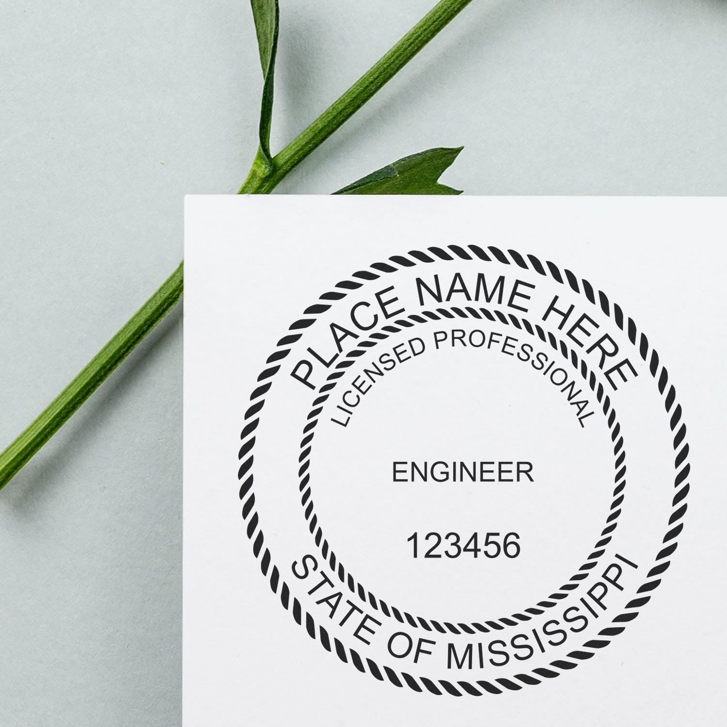 Another Example of a stamped impression of the Mississippi Professional Engineer Seal Stamp on a piece of office paper.