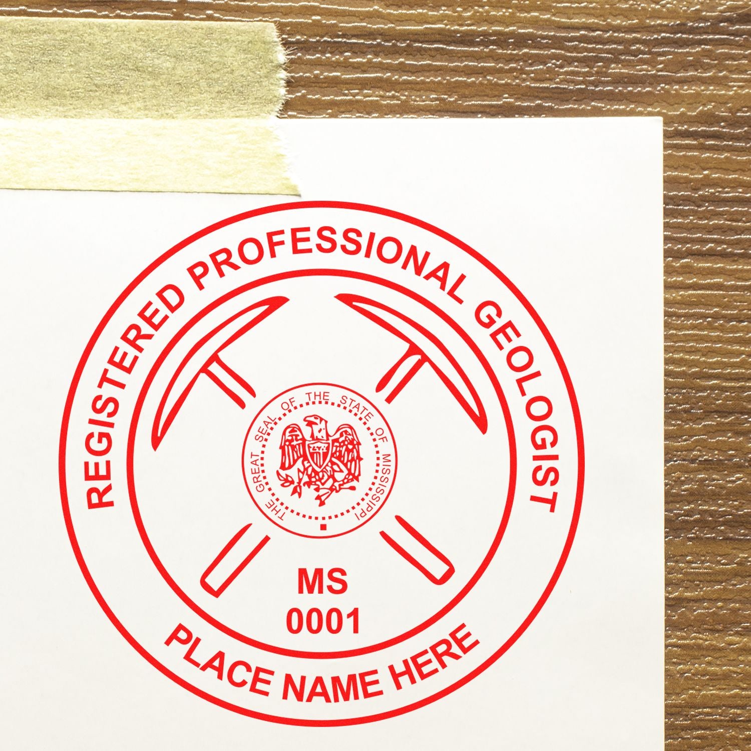 An in use photo of the Mississippi Professional Geologist Seal Stamp showing a sample imprint on a cardstock