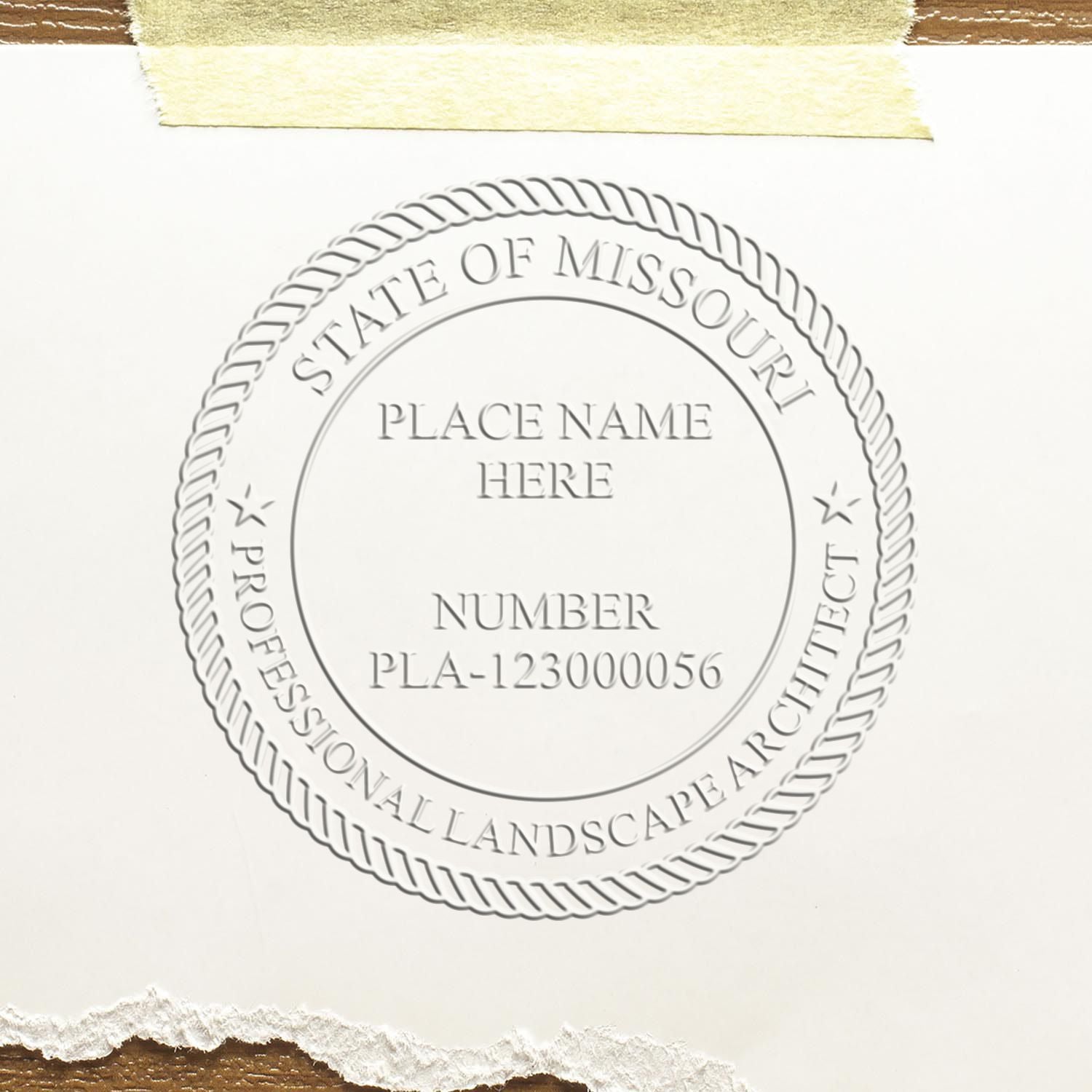 An alternative view of the Missouri Long Reach Landscape Architect Embossing Stamp stamped on a sheet of paper showing the image in use