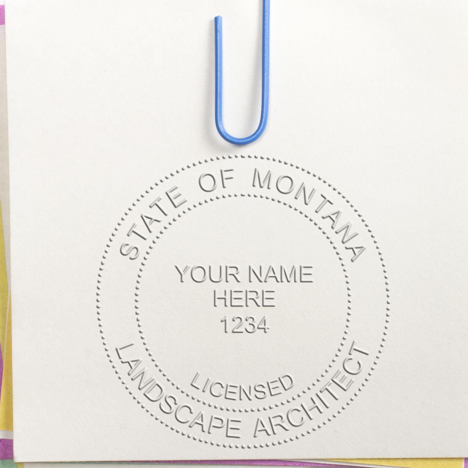 A photograph of the Montana Long Reach Landscape Architect Embossing Stamp stamp impression reveals a vivid, professional image of the on paper.