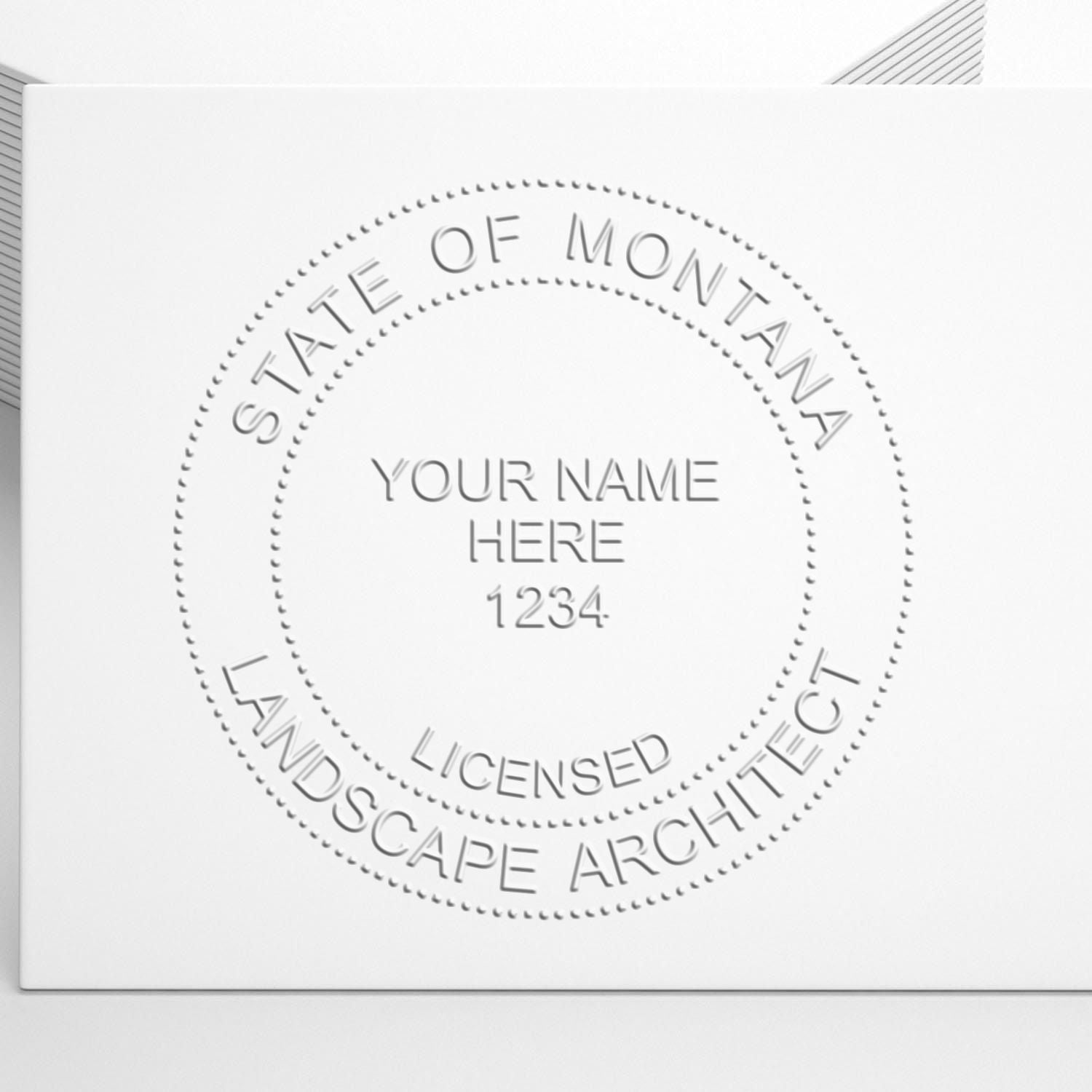 A photograph of the State of Montana Handheld Landscape Architect Seal stamp impression reveals a vivid, professional image of the on paper.