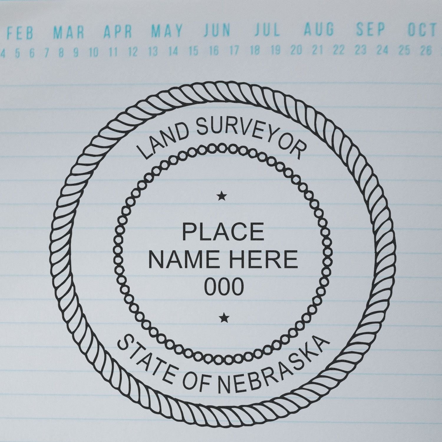 A lifestyle photo showing a stamped image of the Slim Pre-Inked Nebraska Land Surveyor Seal Stamp on a piece of paper