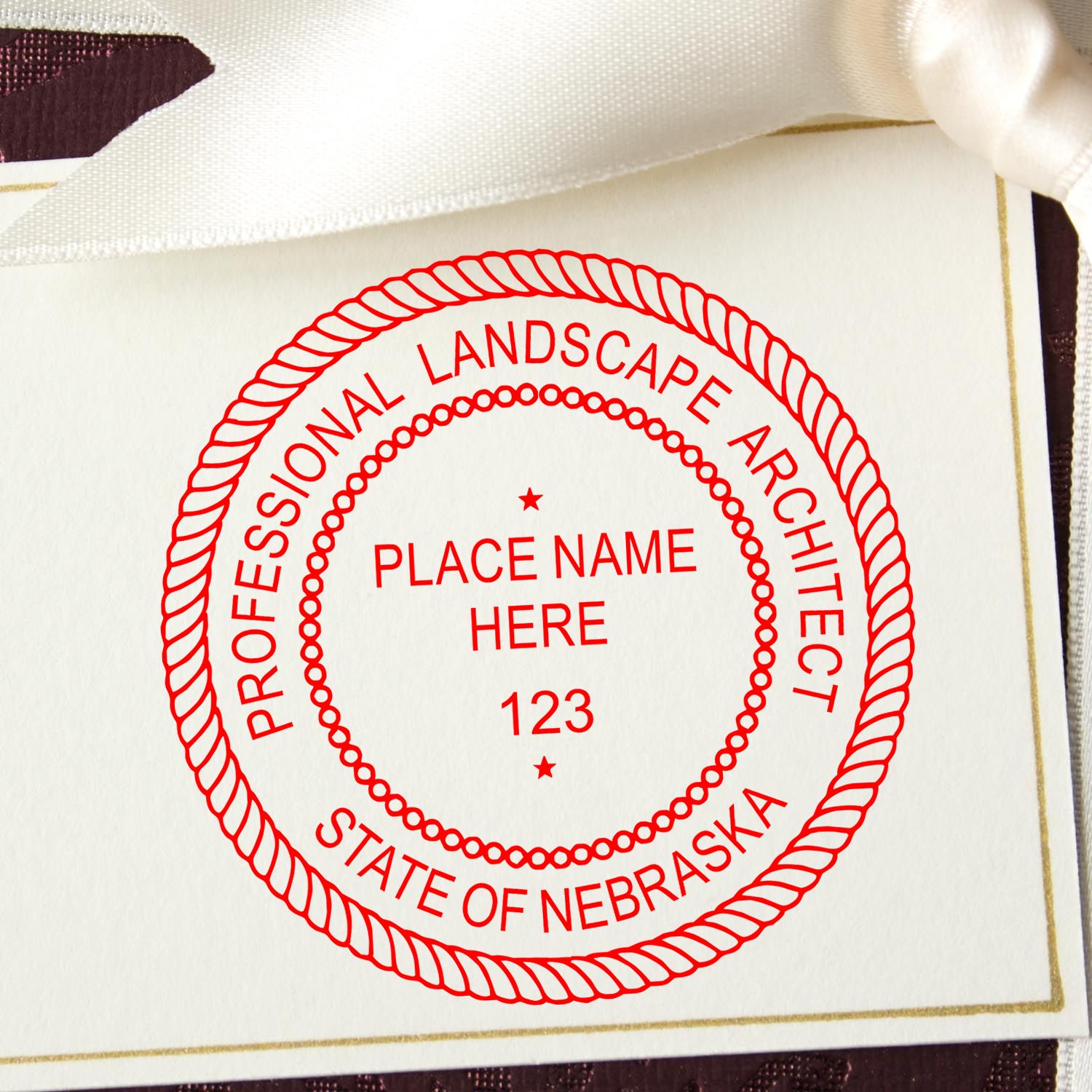 A photograph of the Digital Nebraska Landscape Architect Stamp stamp impression reveals a vivid, professional image of the on paper.