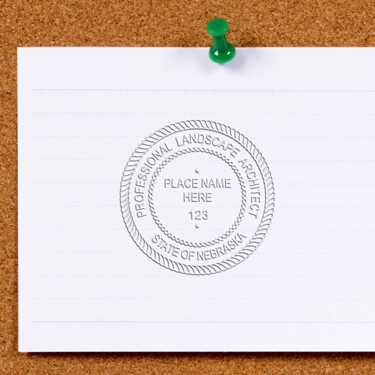 The State of Nebraska Handheld Landscape Architect Seal stamp impression comes to life with a crisp, detailed photo on paper - showcasing true professional quality.