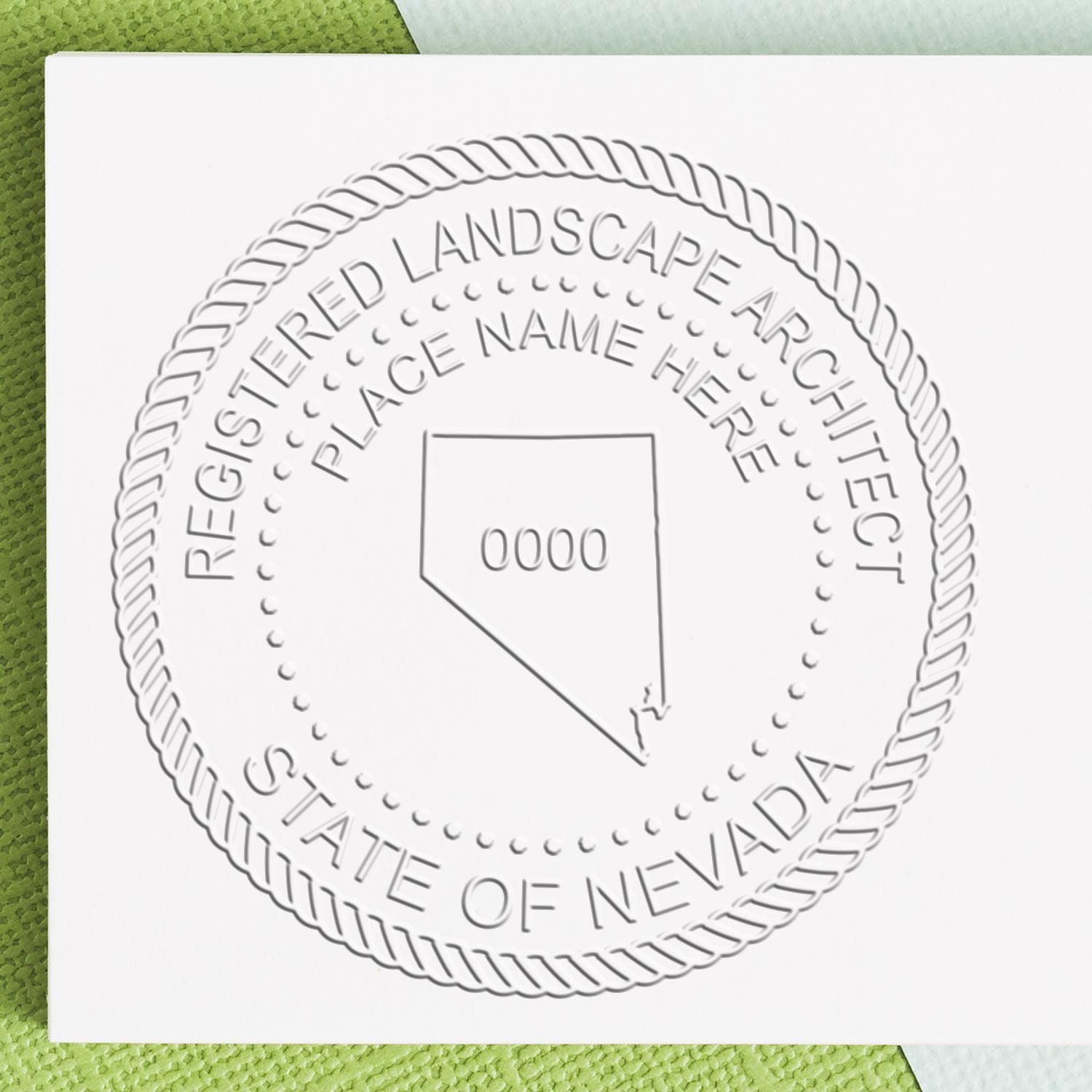 An alternative view of the Nevada Long Reach Landscape Architect Embossing Stamp stamped on a sheet of paper showing the image in use