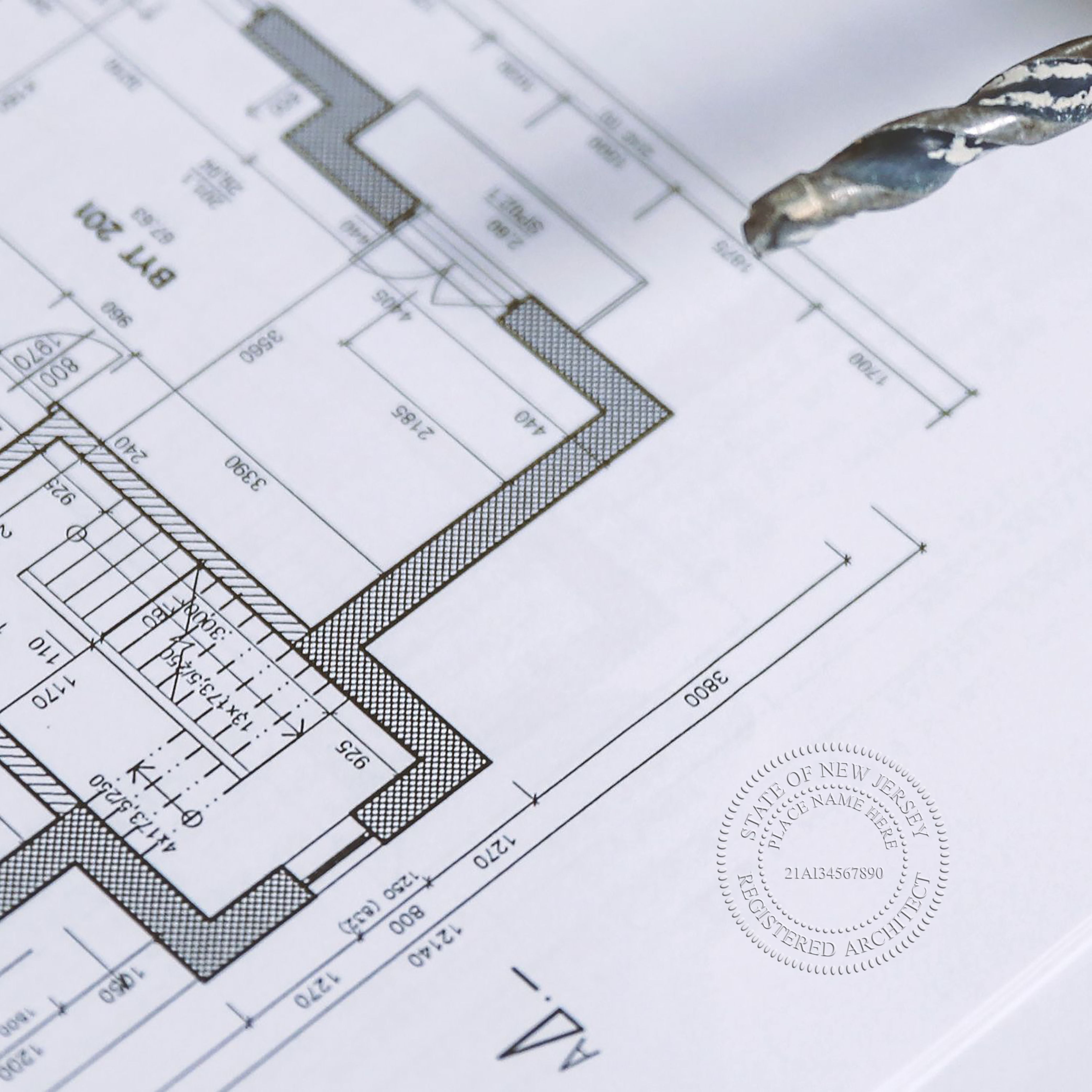 This paper is stamped with a sample imprint of the State of New Jersey Architectural Seal Embosser, signifying its quality and reliability.