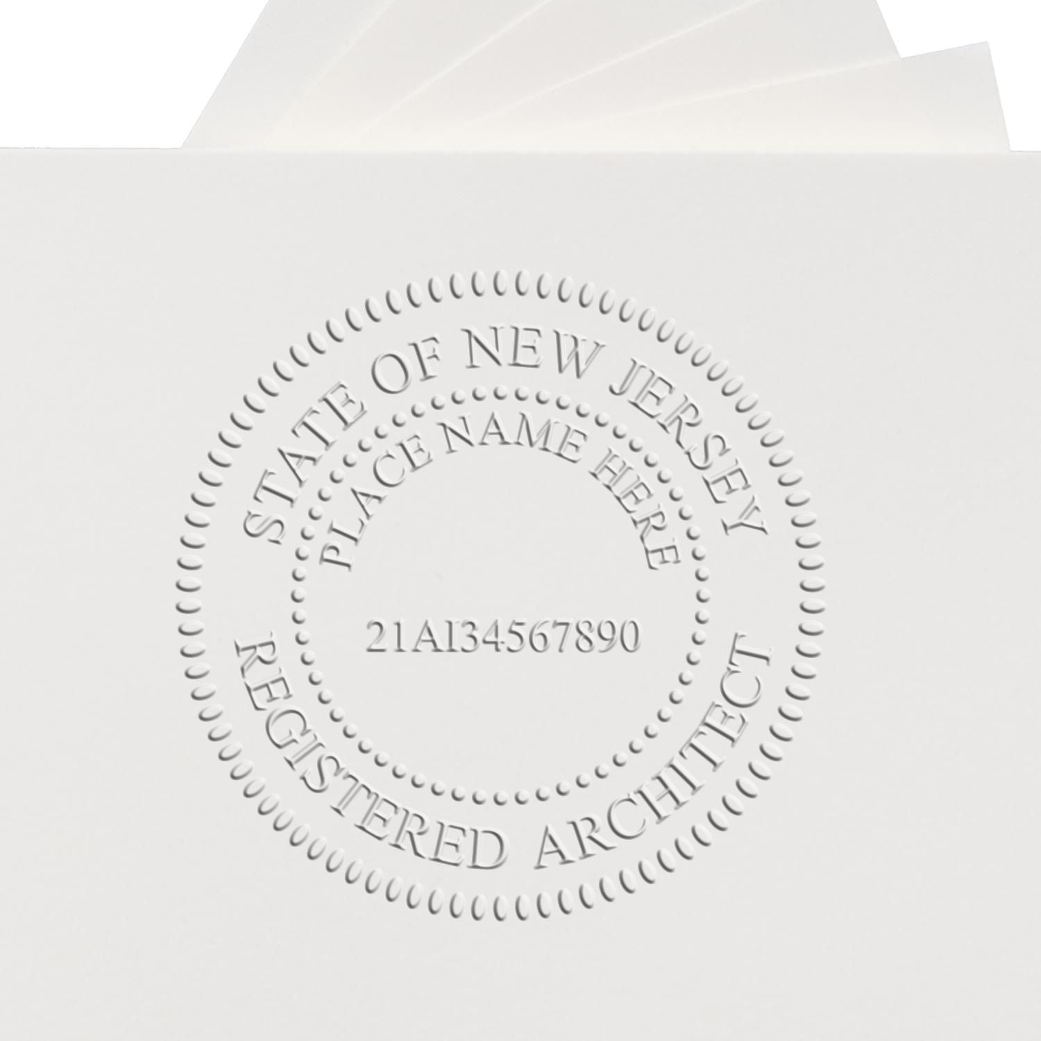 Another Example of a stamped impression of the Heavy Duty Cast Iron New Jersey Architect Embosser on a piece of office paper.