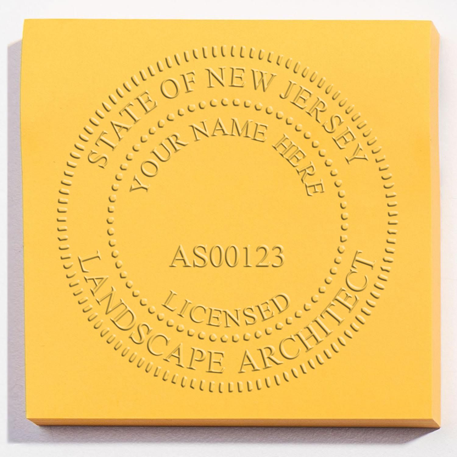 A stamped impression of the State of New Jersey Extended Long Reach Landscape Architect Seal Embosser in this stylish lifestyle photo, setting the tone for a unique and personalized product.