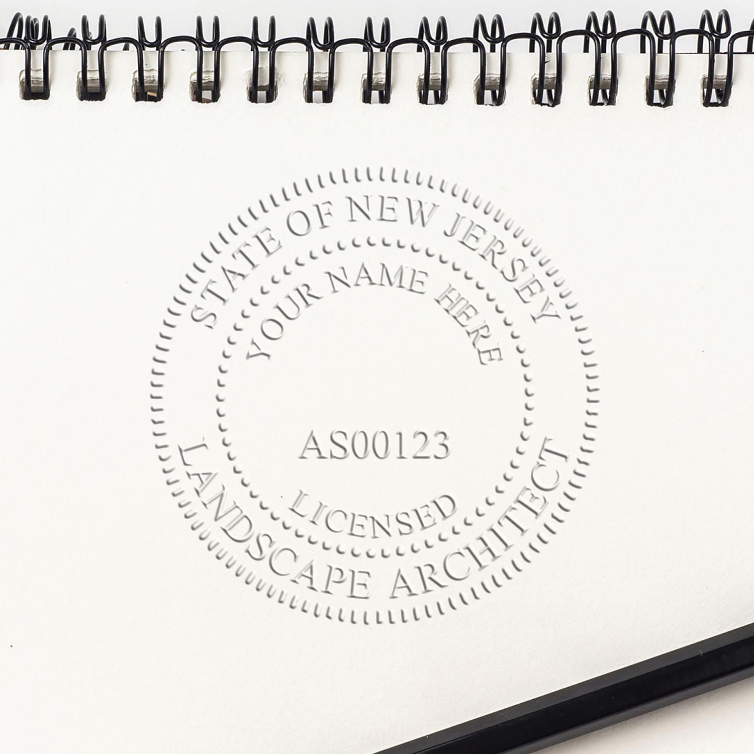 A photograph of the State of New Jersey Handheld Landscape Architect Seal stamp impression reveals a vivid, professional image of the on paper.