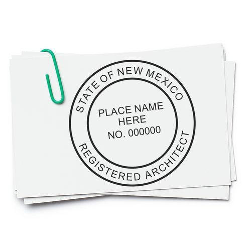 Self Inking New Mexico Architect Stamp on white paper with a green paperclip, displaying State of New Mexico Registered Architect and placeholder text.