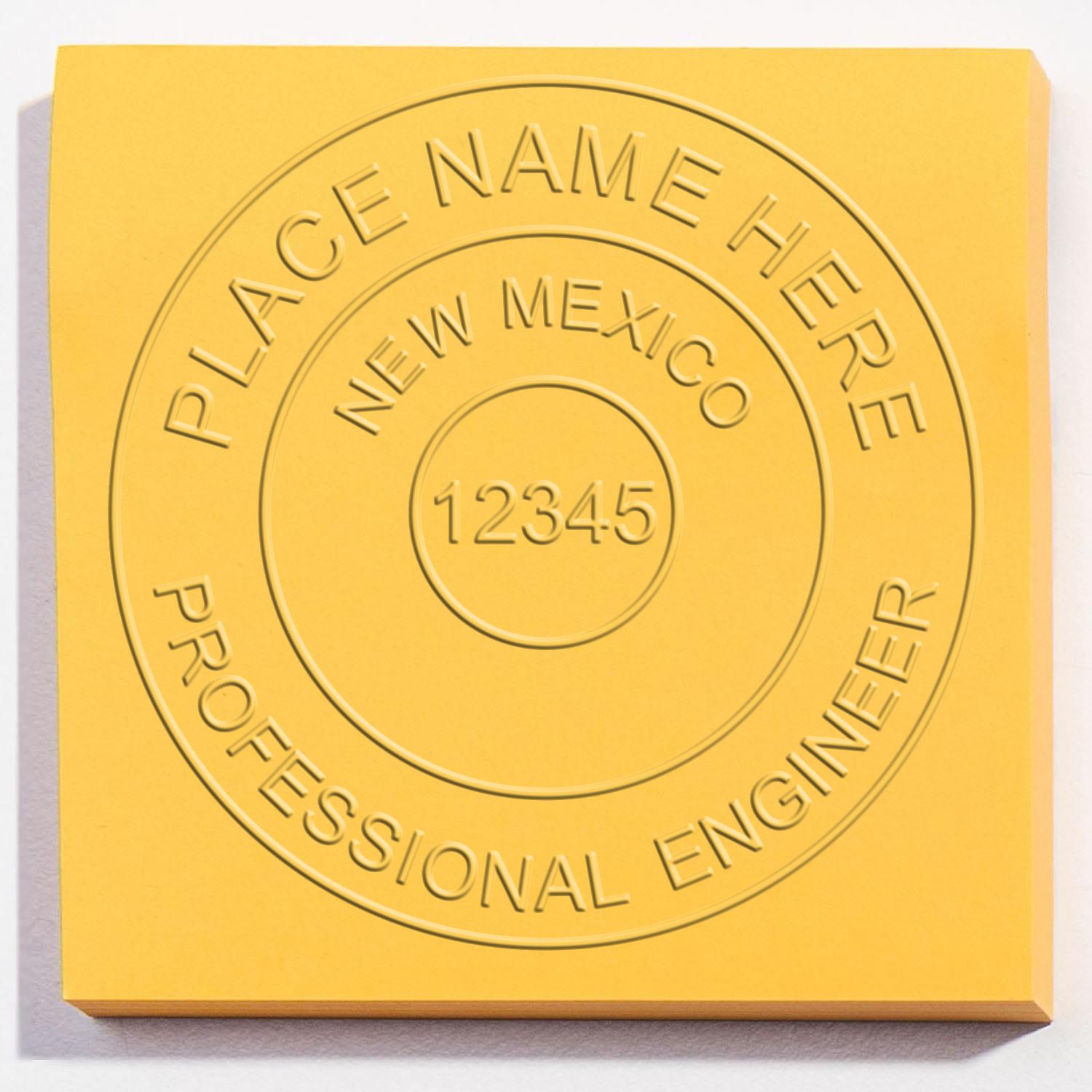 A photograph of the Soft New Mexico Professional Engineer Seal stamp impression reveals a vivid, professional image of the on paper.