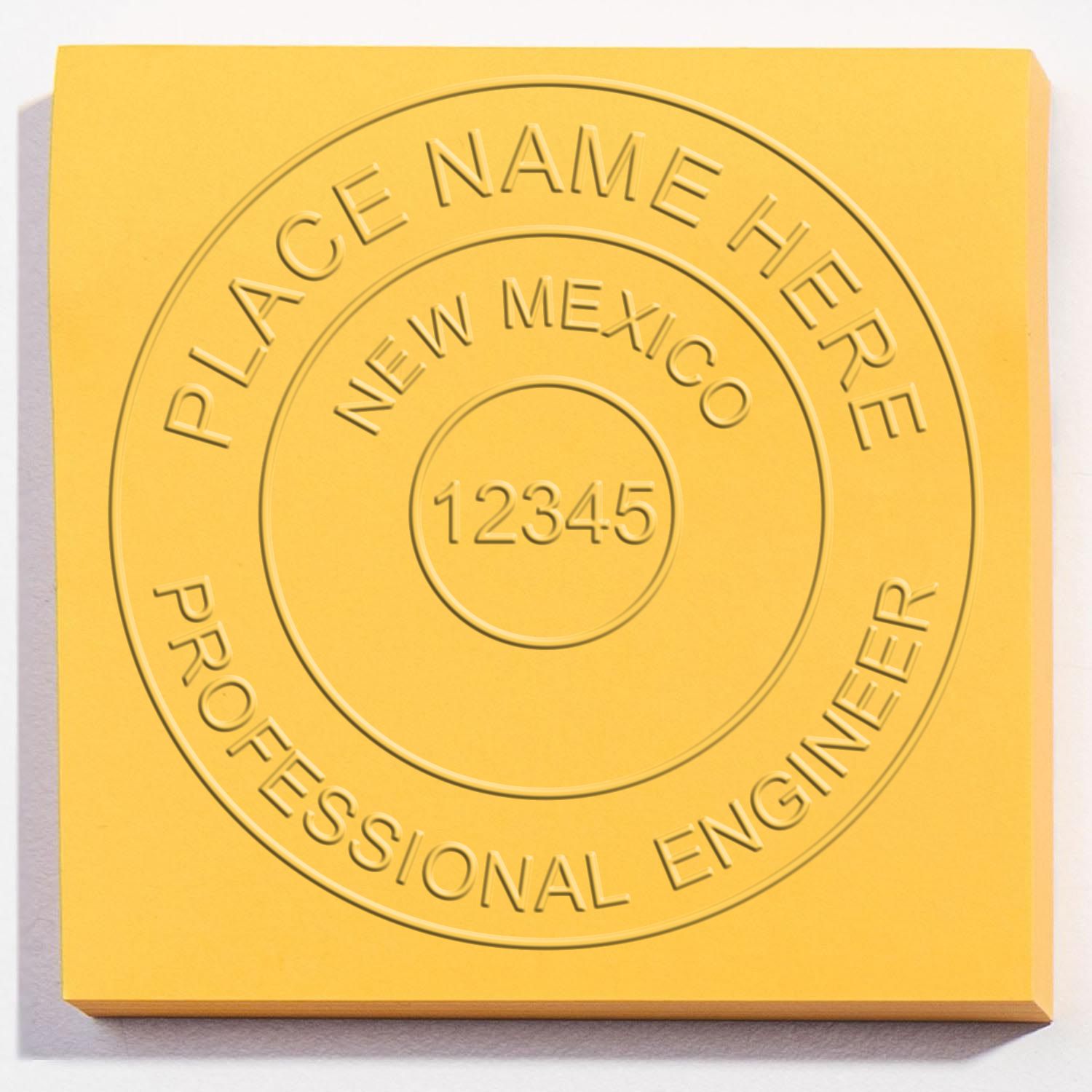 A photograph of the New Mexico Engineer Desk Seal stamp impression reveals a vivid, professional image of the on paper.