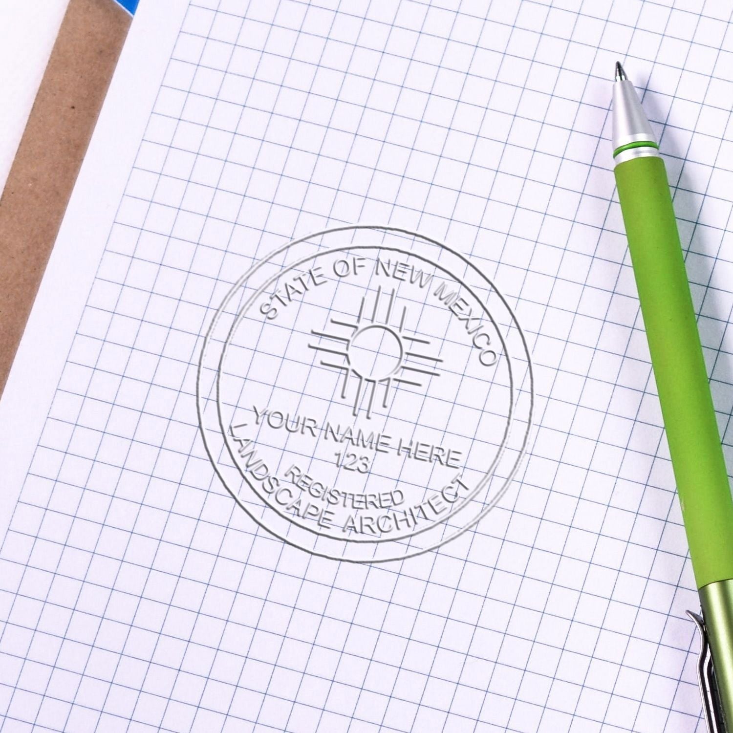 Another Example of a stamped impression of the New Mexico Long Reach Landscape Architect Embossing Stamp on a piece of office paper.