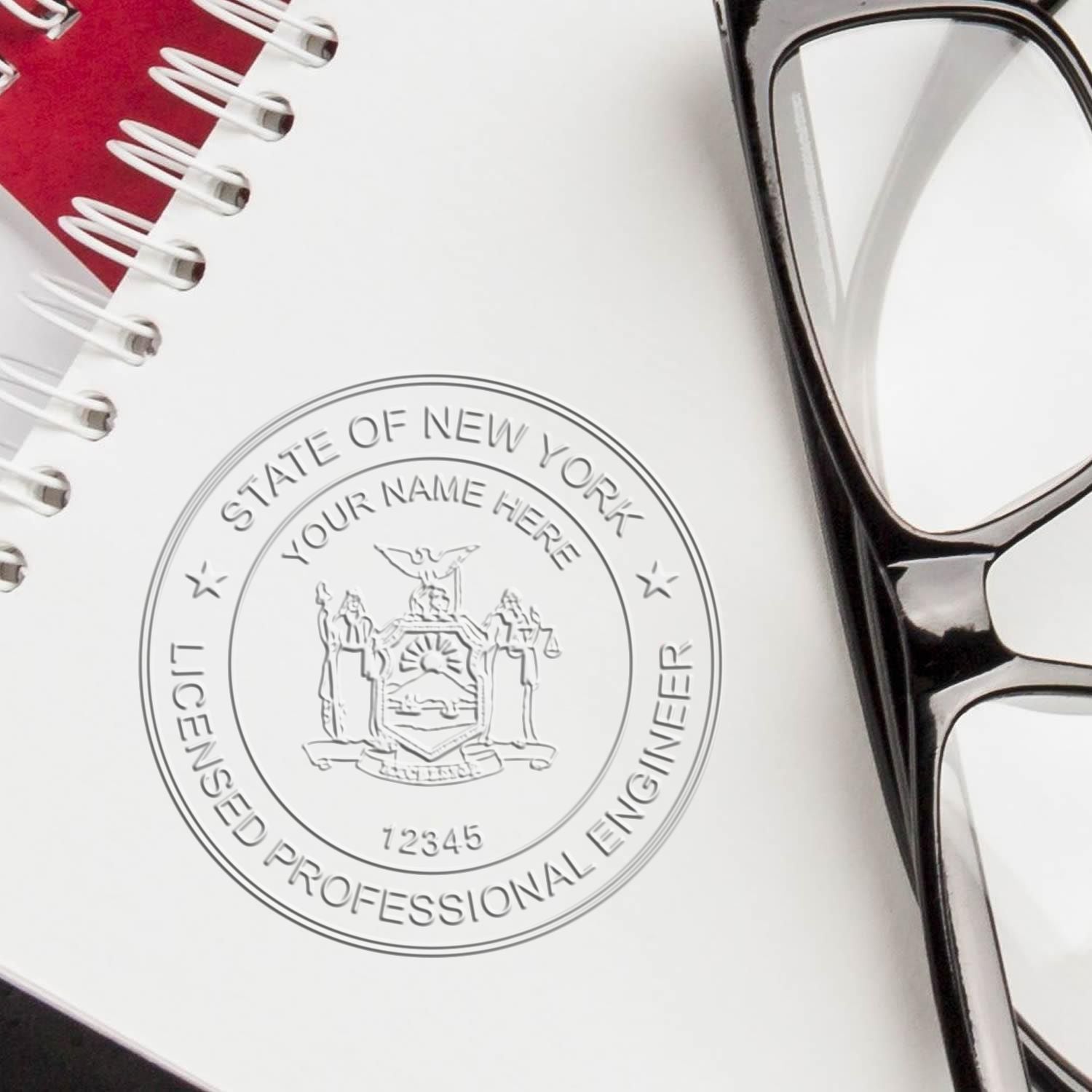 An alternative view of the State of New York Extended Long Reach Engineer Seal stamped on a sheet of paper showing the image in use