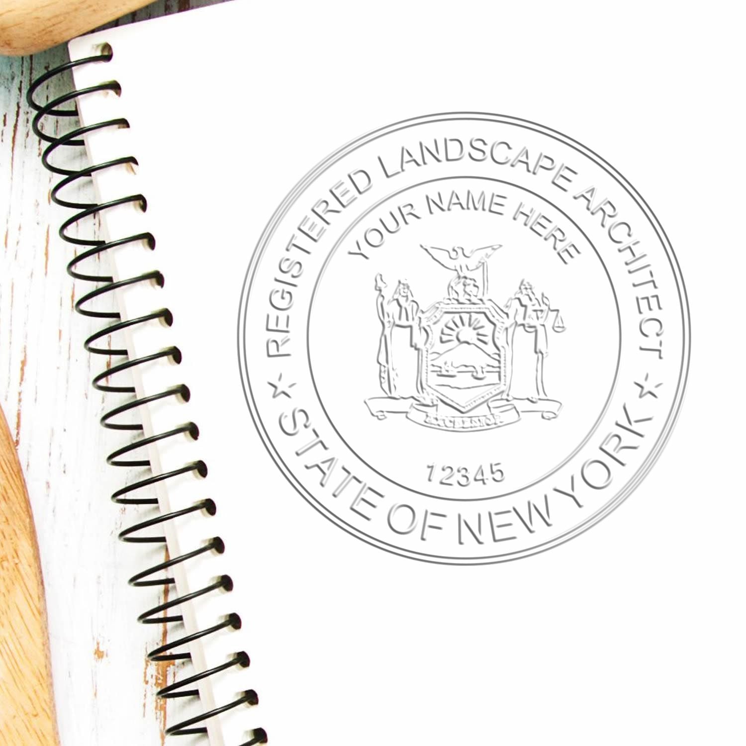 A stamped impression of the State of New York Handheld Landscape Architect Seal in this stylish lifestyle photo, setting the tone for a unique and personalized product.