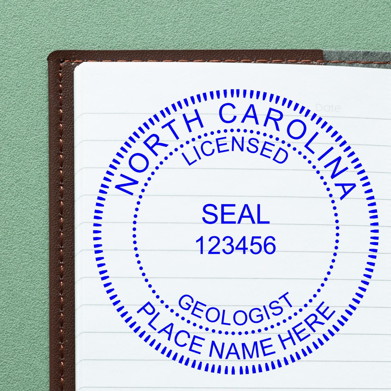 A lifestyle photo showing a stamped image of the Digital North Carolina Geologist Stamp, Electronic Seal for North Carolina Geologist on a piece of paper