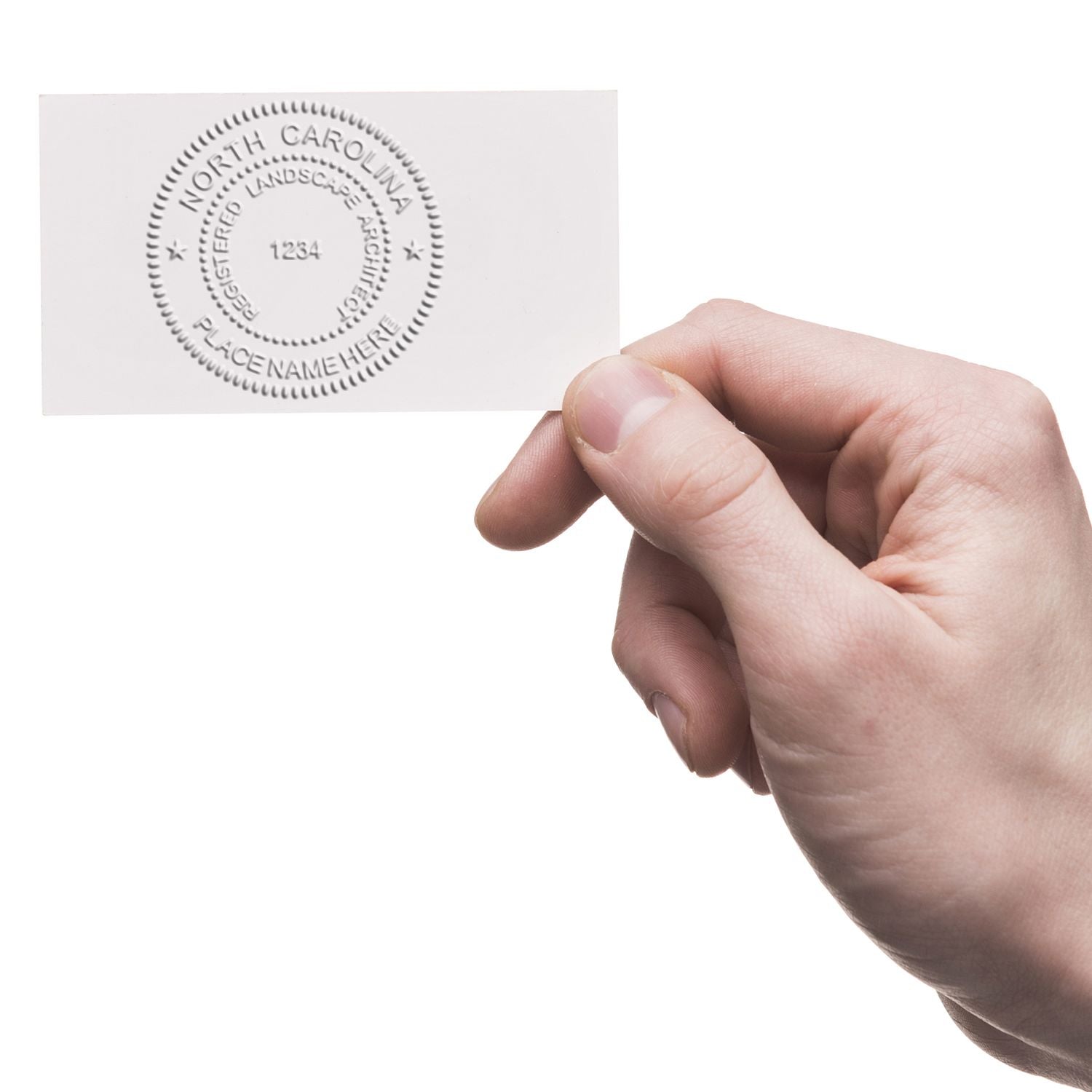 The State of North Carolina Handheld Landscape Architect Seal stamp impression comes to life with a crisp, detailed photo on paper - showcasing true professional quality.