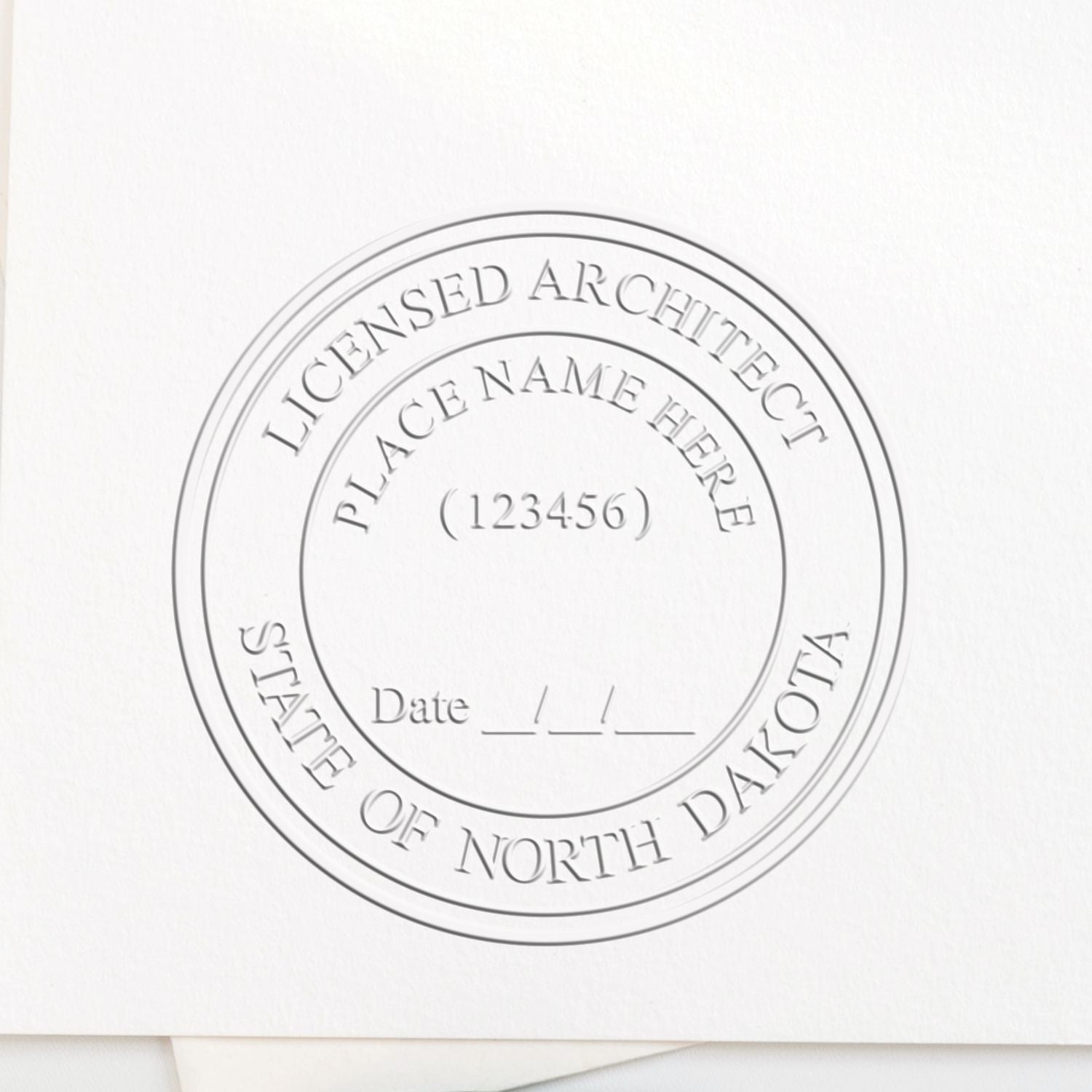 A photograph of the Hybrid North Dakota Architect Seal stamp impression reveals a vivid, professional image of the on paper.