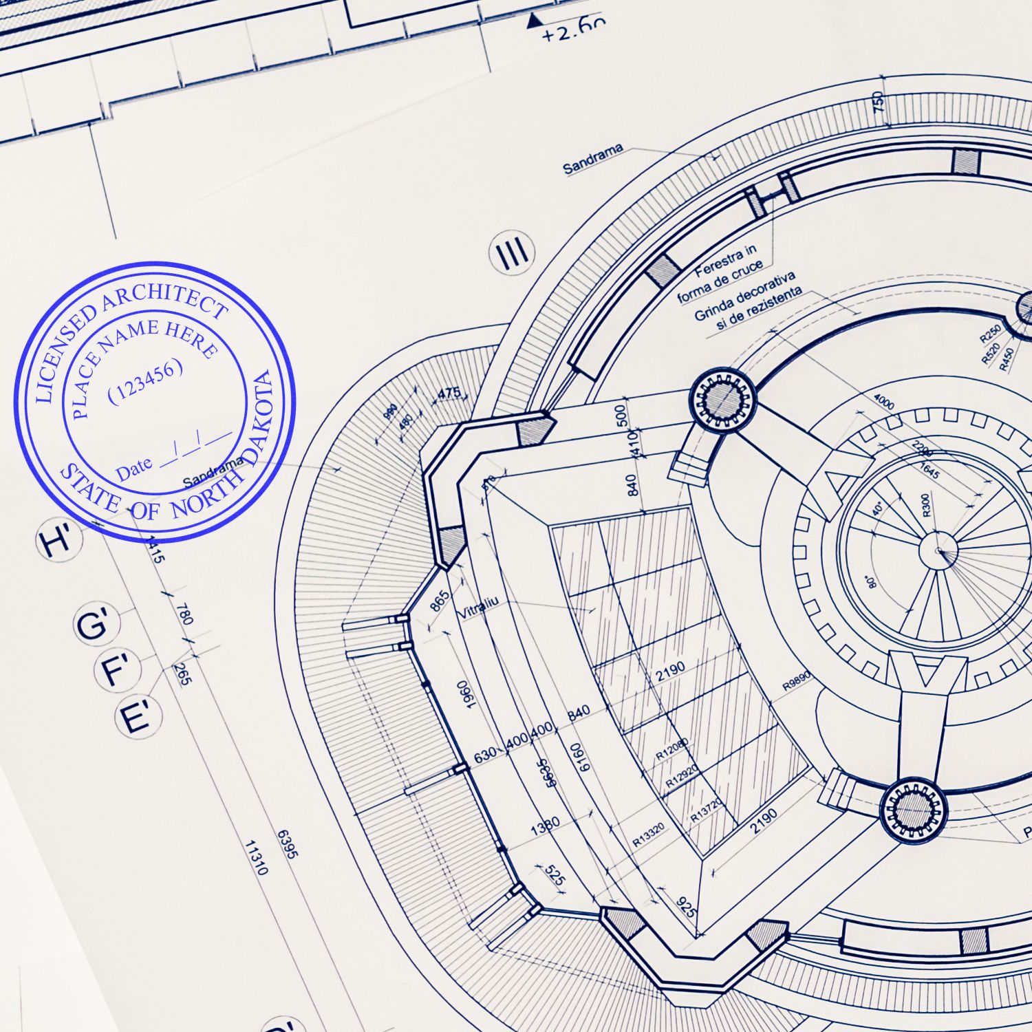 Blueprint with a Self Inking North Dakota Architect Stamp in blue ink, showing detailed architectural design and official seal.