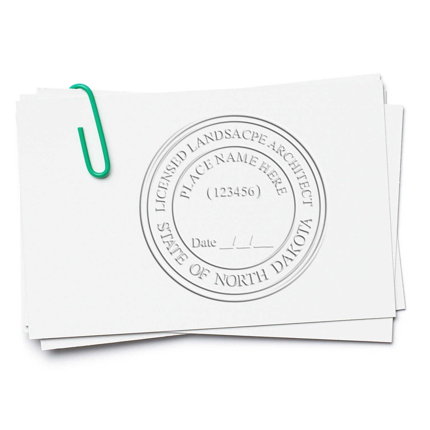 A photograph of the State of North Dakota Extended Long Reach Landscape Architect Seal Embosser stamp impression reveals a vivid, professional image of the on paper.