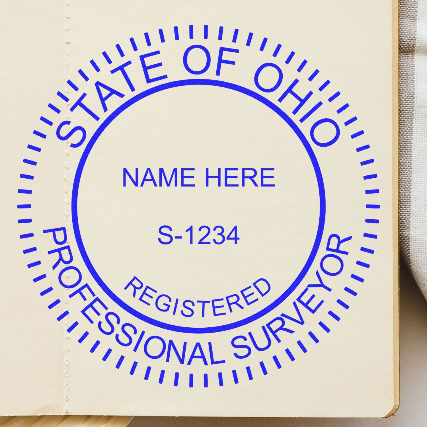 Digital Ohio Land Surveyor Stamp, Electronic Seal for Ohio Land Surveyor, showing a customizable blue circular seal on a beige background.