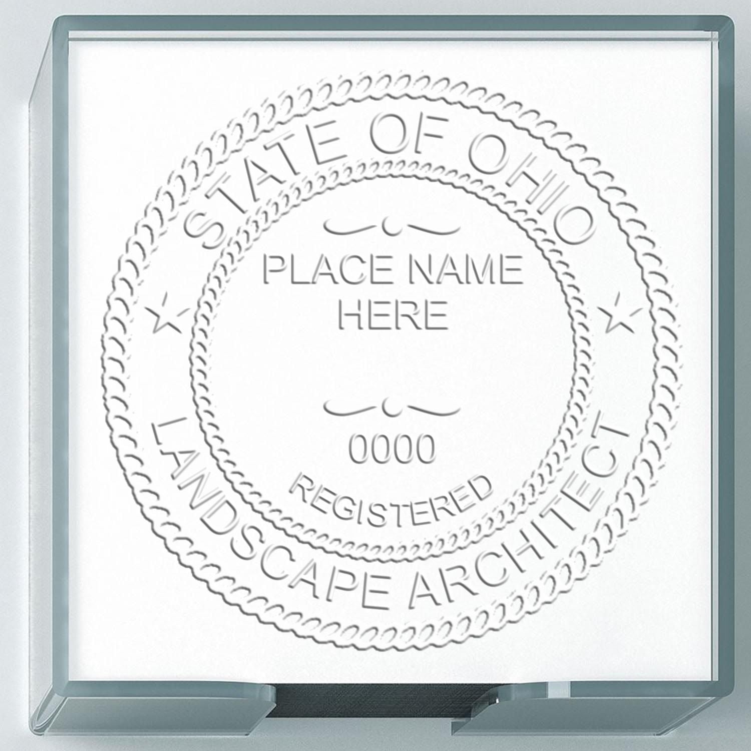 An alternative view of the Heavy Duty Ohio Landscape Architect Cast Iron Embosser stamped on a sheet of paper showing the image in use